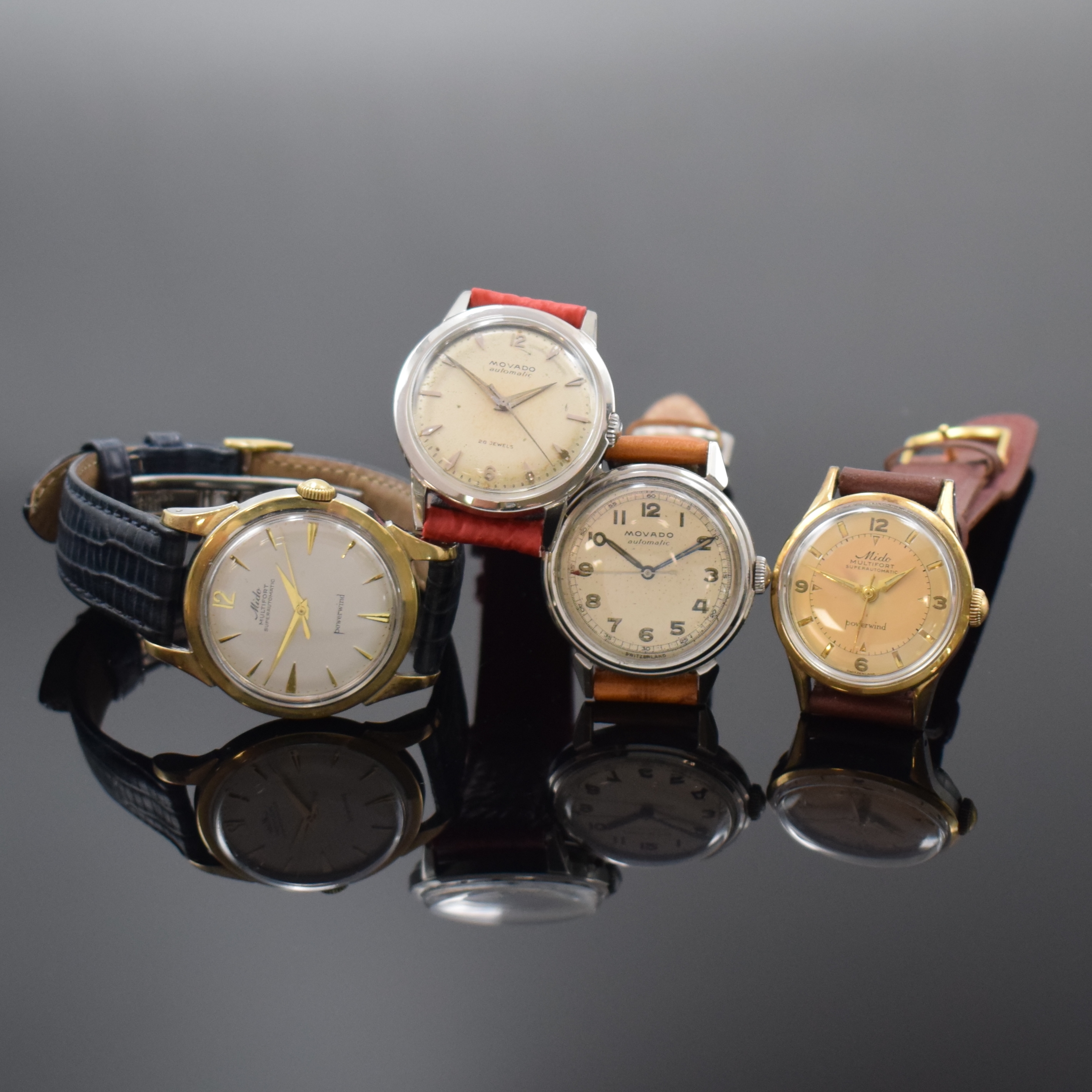 MIDO / MOVADO je 2 Armbanduhren in Stahl und Stahl/Gold, Schweiz ca. 1945 - 1960, Automatik, verschr. Geh., silb. Zifferbl. pat./fl., 2 x Movado im ...