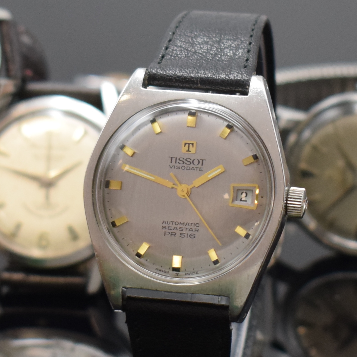 Detail a: TISSOT PR516 und 6 weitere Automatik Armbanduhren, Schweiz ca. 1940 - 1970, 1) Tissot PR516, verschr. Stahlgeh., silb. Zifferbl., vern. Werk Kal. ...