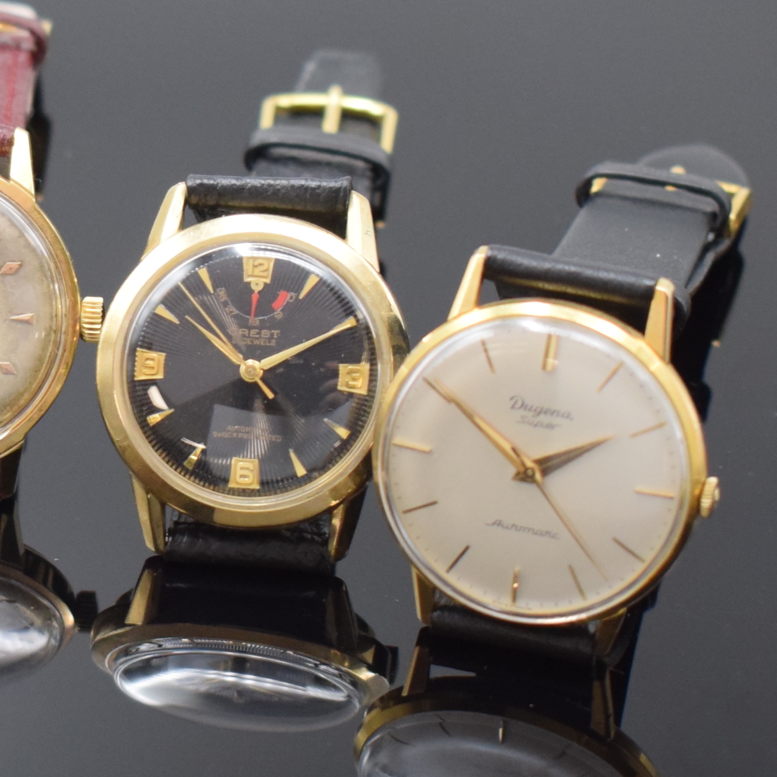 Detail b: Konvolut 5 vergoldete Armbanduhren, Schweiz ca. 1950 - 1965, Automatik/Handaufzug, 1) DUGENA Super Automatic, Stahlboden aufgedr., rotgold. ...