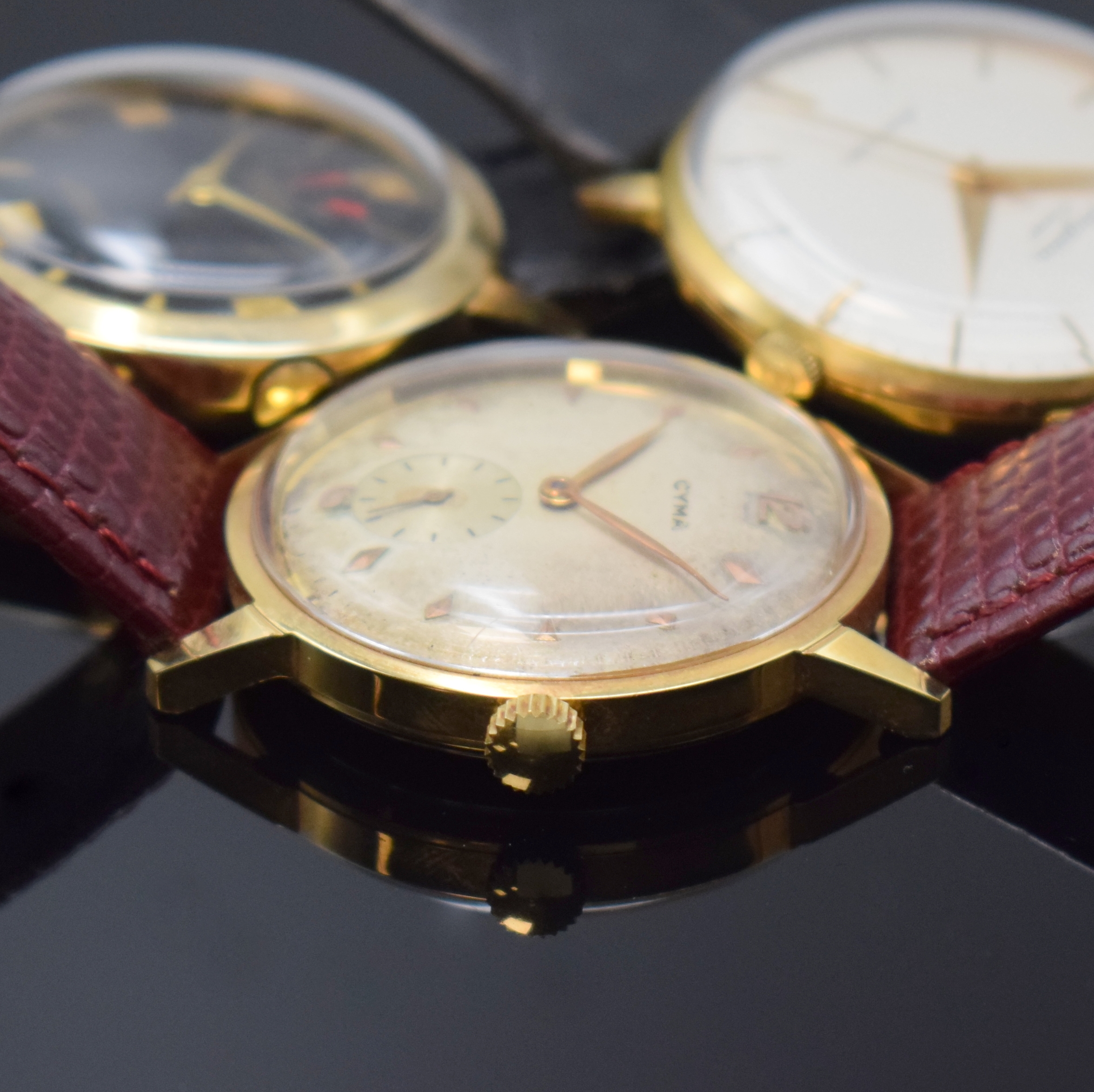 Detail d: Konvolut 5 vergoldete Armbanduhren, Schweiz ca. 1950 - 1965, Automatik/Handaufzug, 1) DUGENA Super Automatic, Stahlboden aufgedr., rotgold. ...