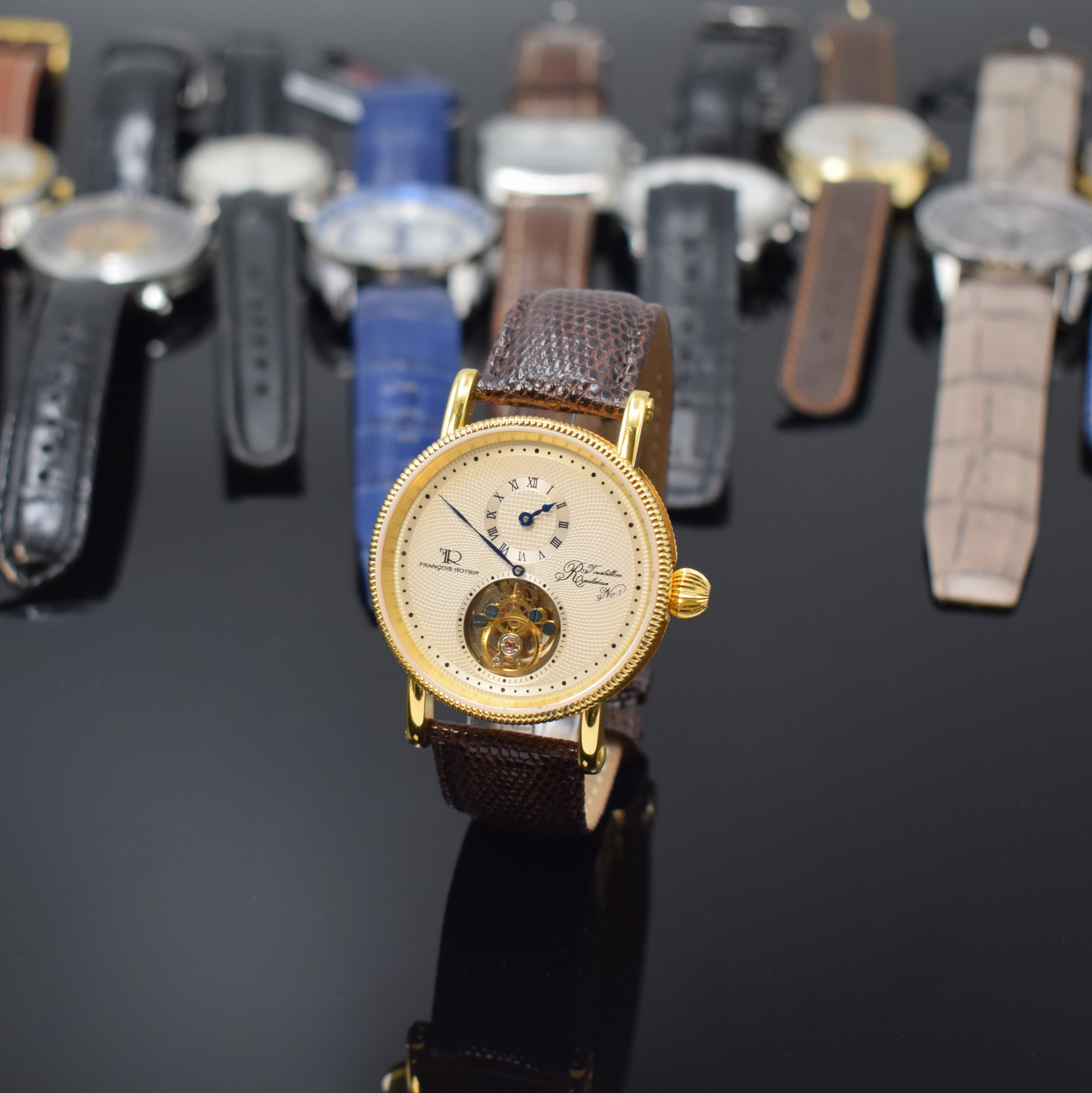 Francois Roitier Armbanduhr mit TOURBILLON sowie 10 weitere Armbanduhren, Russland/ Schweiz/Asien ca. 1980 - 2020, Handaufzug/ Automatik, 7 x ...