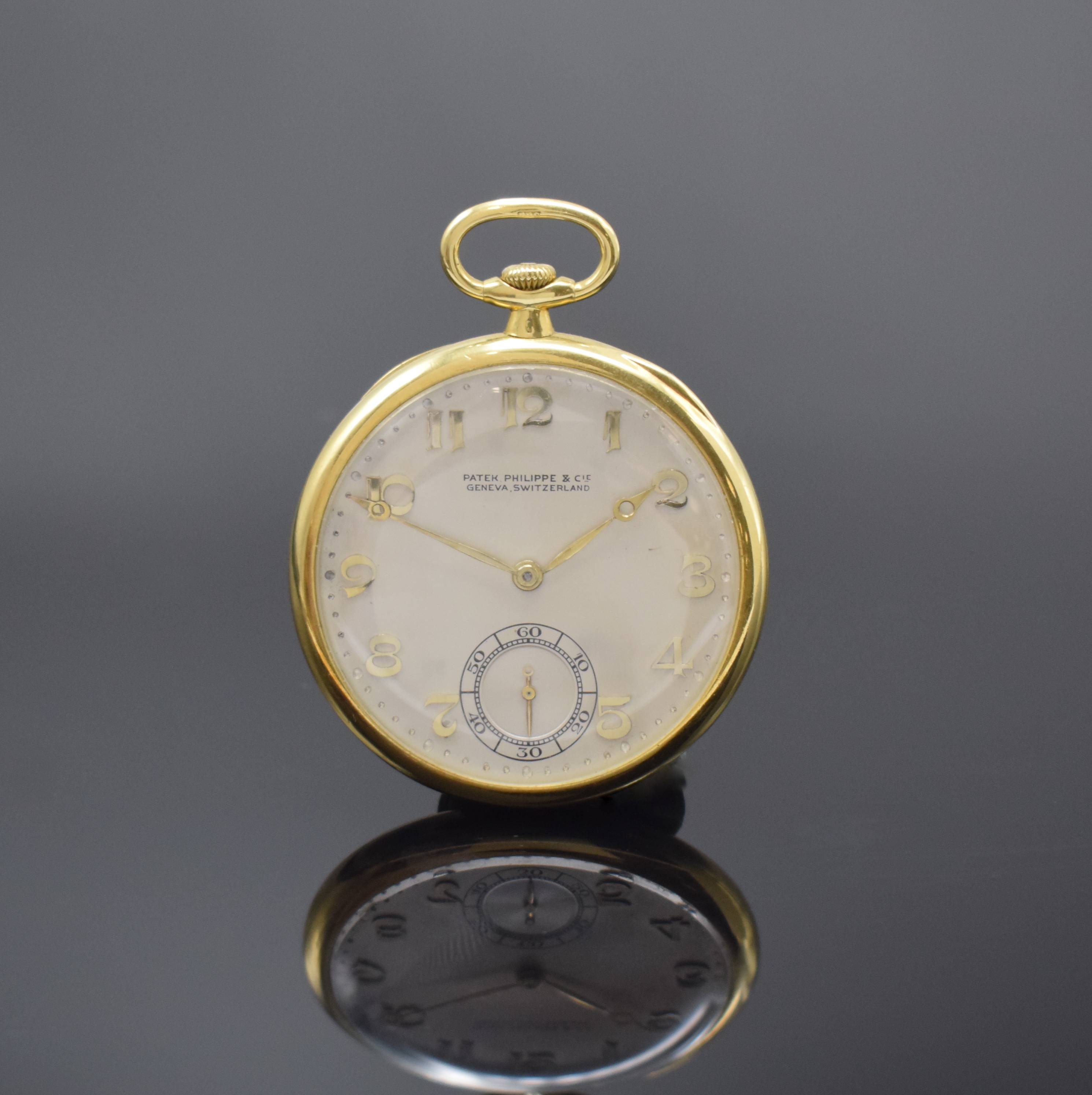 PATEK PHILIPPE & Cie offene Frackuhr in GG 750/000, Schweiz um 1925, glattes Geh. dell. m. gekürztem Scharnier, matt-silb. Zifferbl. pat., aufges. ...