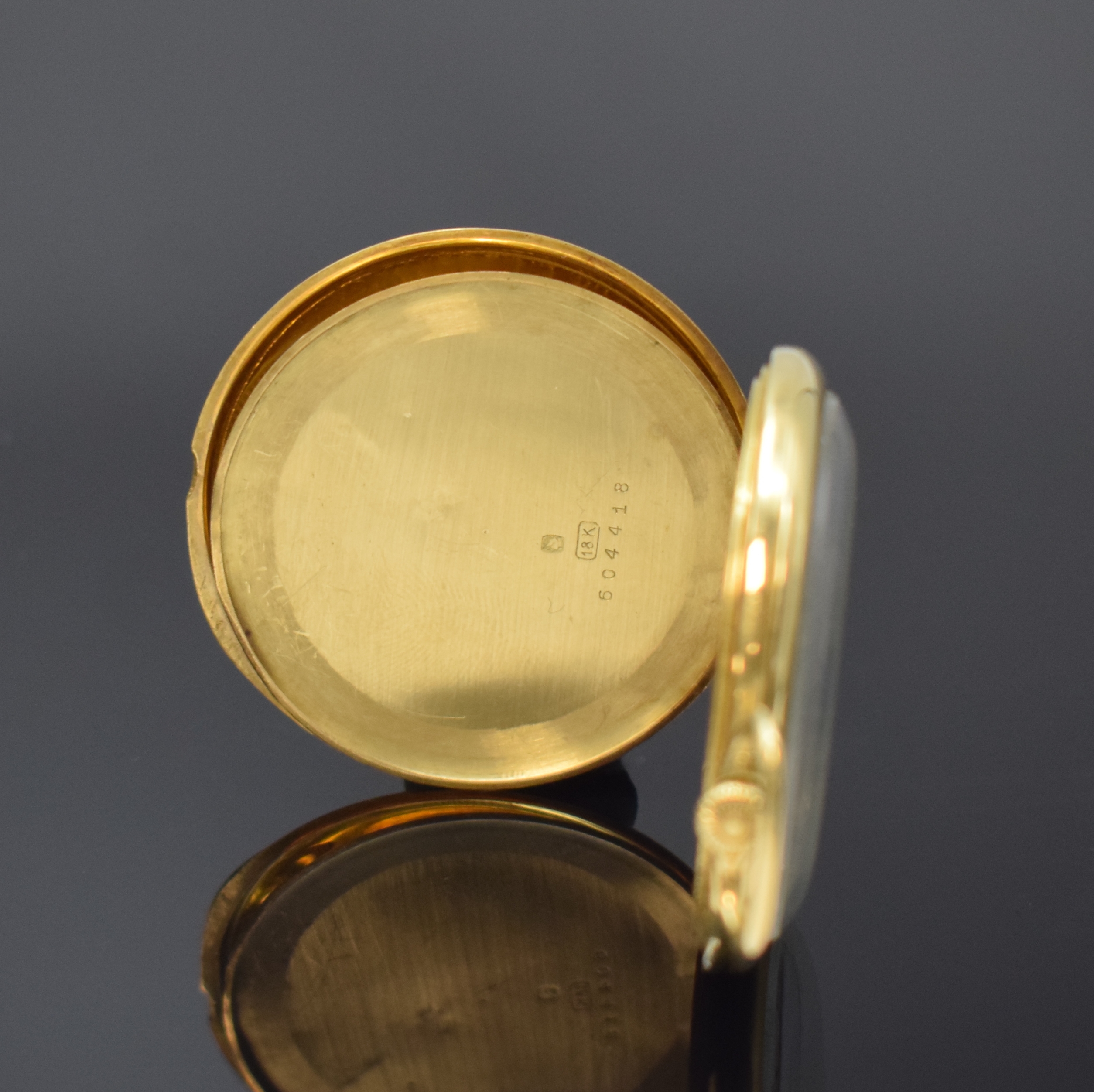 Detail d: PATEK PHILIPPE & Cie offene Frackuhr in GG 750/000, Schweiz um 1925, glattes Geh. dell. m. gekürztem Scharnier, matt-silb. Zifferbl. pat., aufges. ...