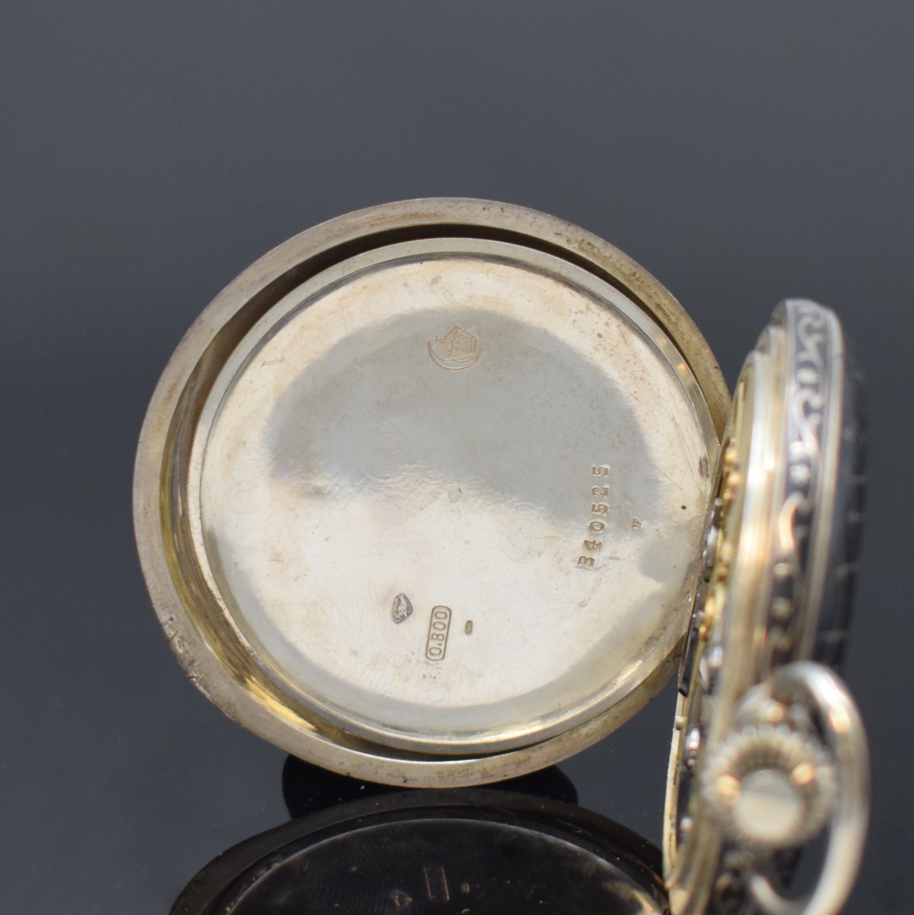 Detail c: Konvolut: 2 Tulasilber-Taschenuhren, beide Deutschland/Schweiz um 1910, 1 x NOMOS Savonette, Geh. ber., Emailzifferbl. haarr., gold. Birnenzeiger, ...