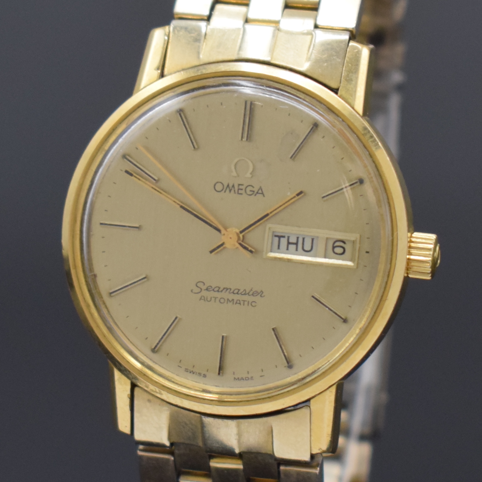Detail a: OMEGA Seamaster vergoldete Armbanduhr Referenz 166.0209, Schweiz um 1979, Automatik, orig. verg. Gliederband m. Faltschl., Boden aufgedr., ...