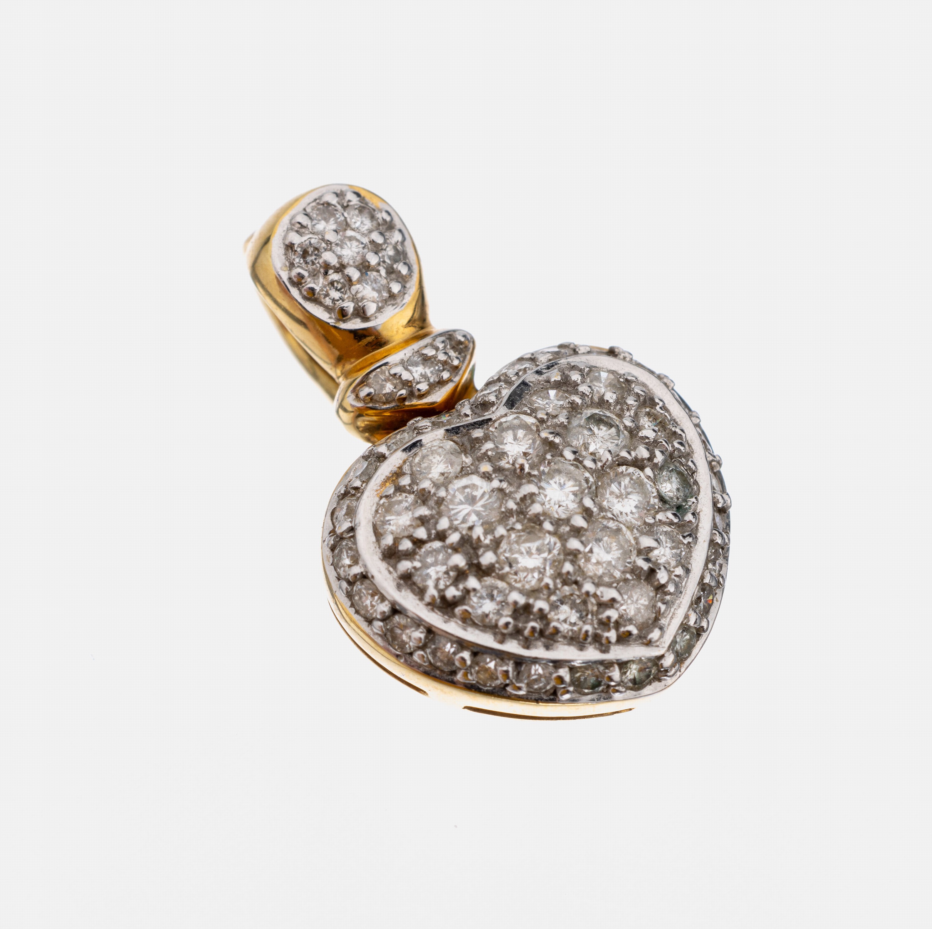 14 kt Gold Brillant-Clipanhänger "Herz", GG/WG 585/000, 52 in WG gefasste Brillanten zus. ca. 1.0 ct Weiß-l.get.Weiß/p, L. ca. 2.5 cm, ...