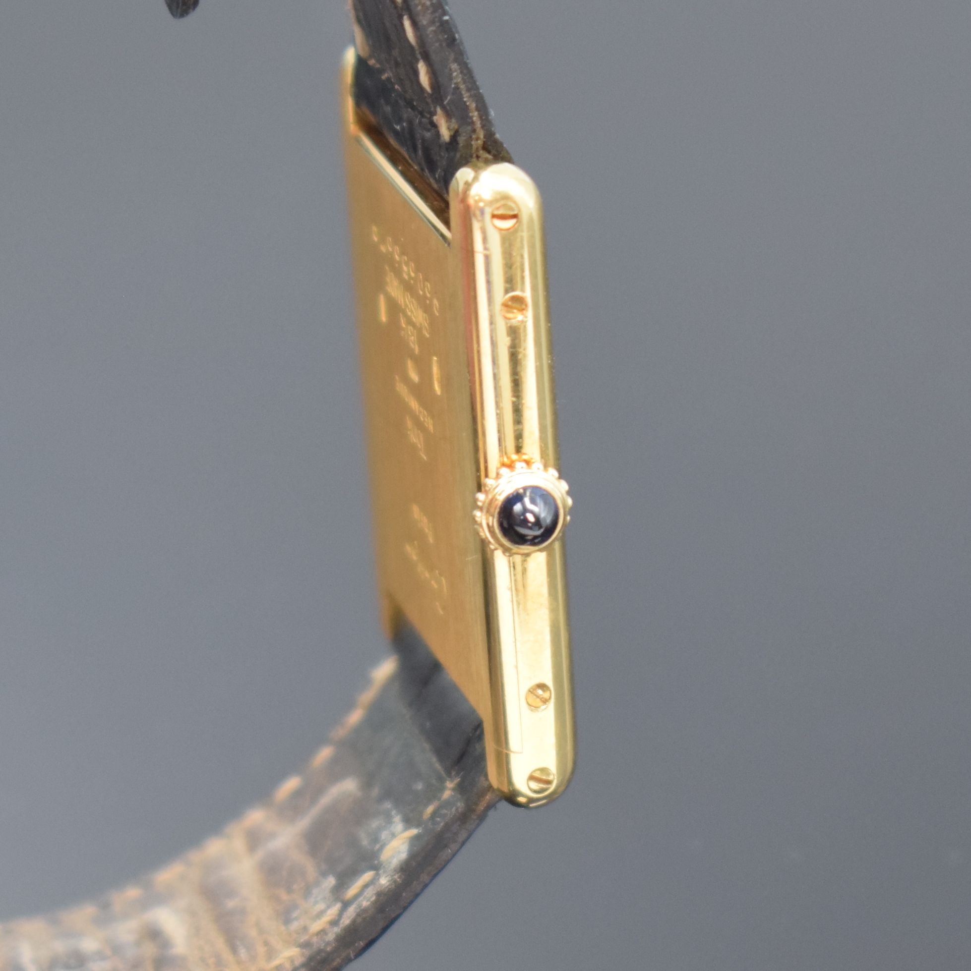 Detail c: CARTIER Tank Armbanduhr in GG 750/000, Schweiz um 2000, Handaufzug, Geh. 4-fach verschr., orig. Lederband m. orig. GG 750/000 Faltschl., ...