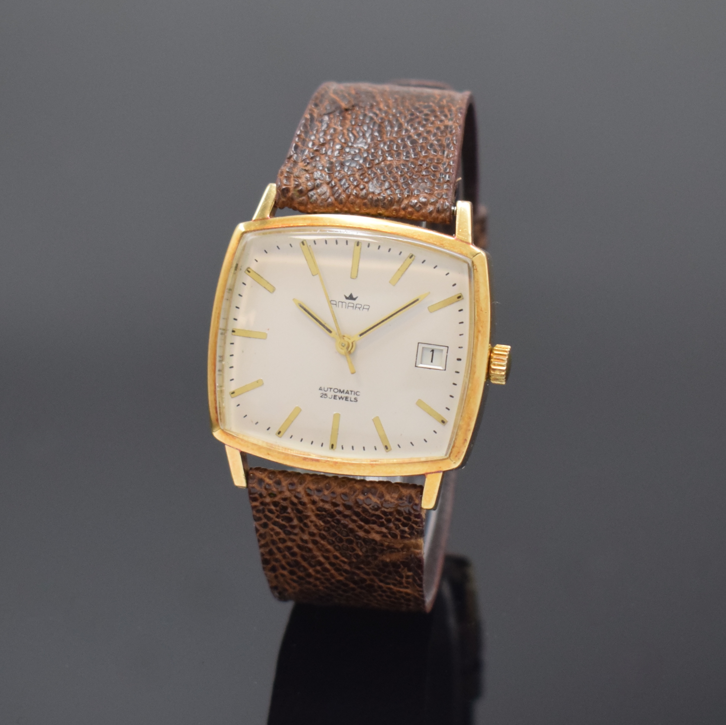 AMARA Herrenarmbanduhr in GG 585/000, Schweiz um 1975, Automatik, Boden aufgedr., silb. Zifferbl. rest., gold. Std.-Ind., gold. Zeiger, Datum b. 3, ...