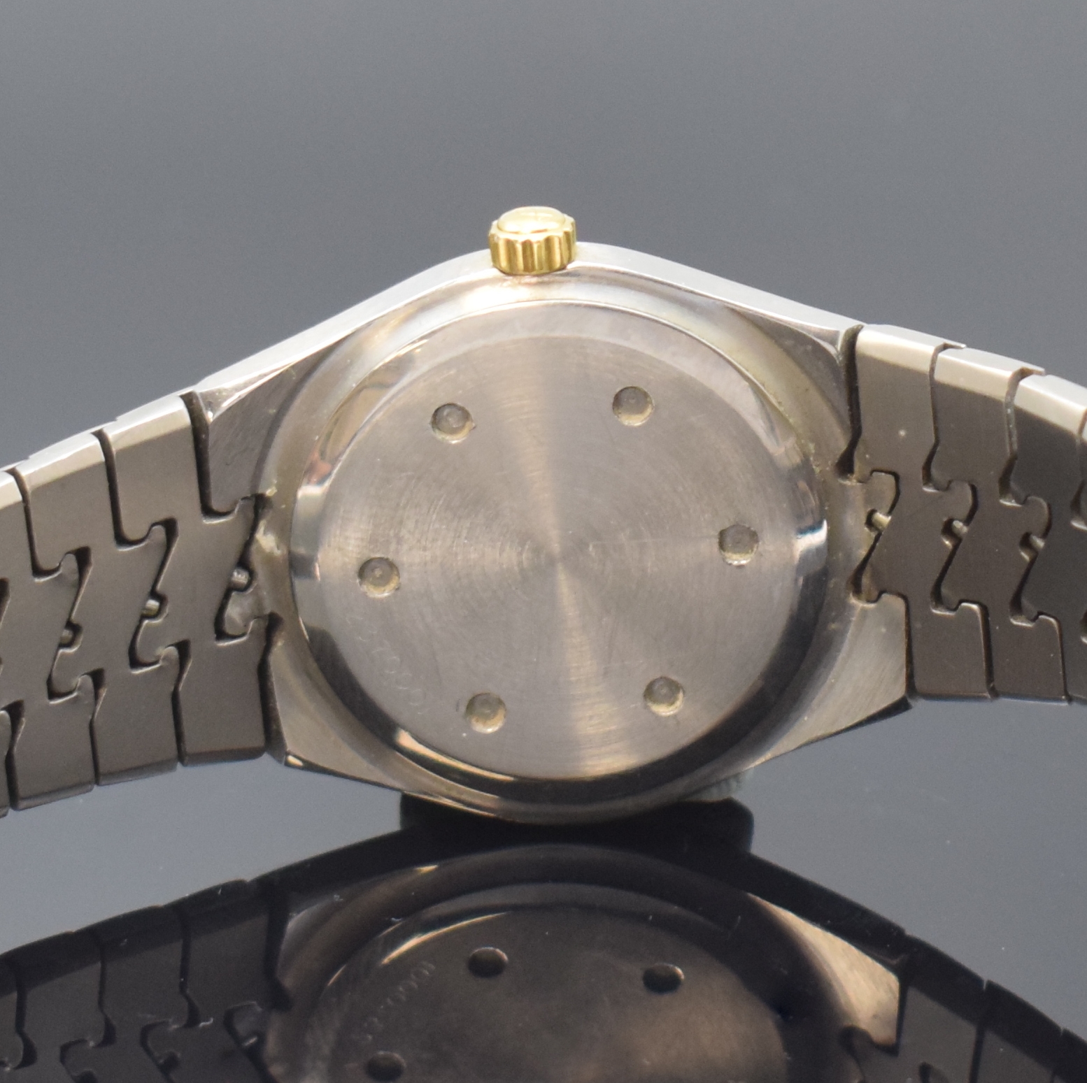 Detail d: IWC Ingenieur Armbanduhr in Stahl/Gold Referenz 3350, Schweiz um 1985, quarz, Boden u. Krone verschr., orig. Titan- Gliederband m. Faltschl., weißes ...