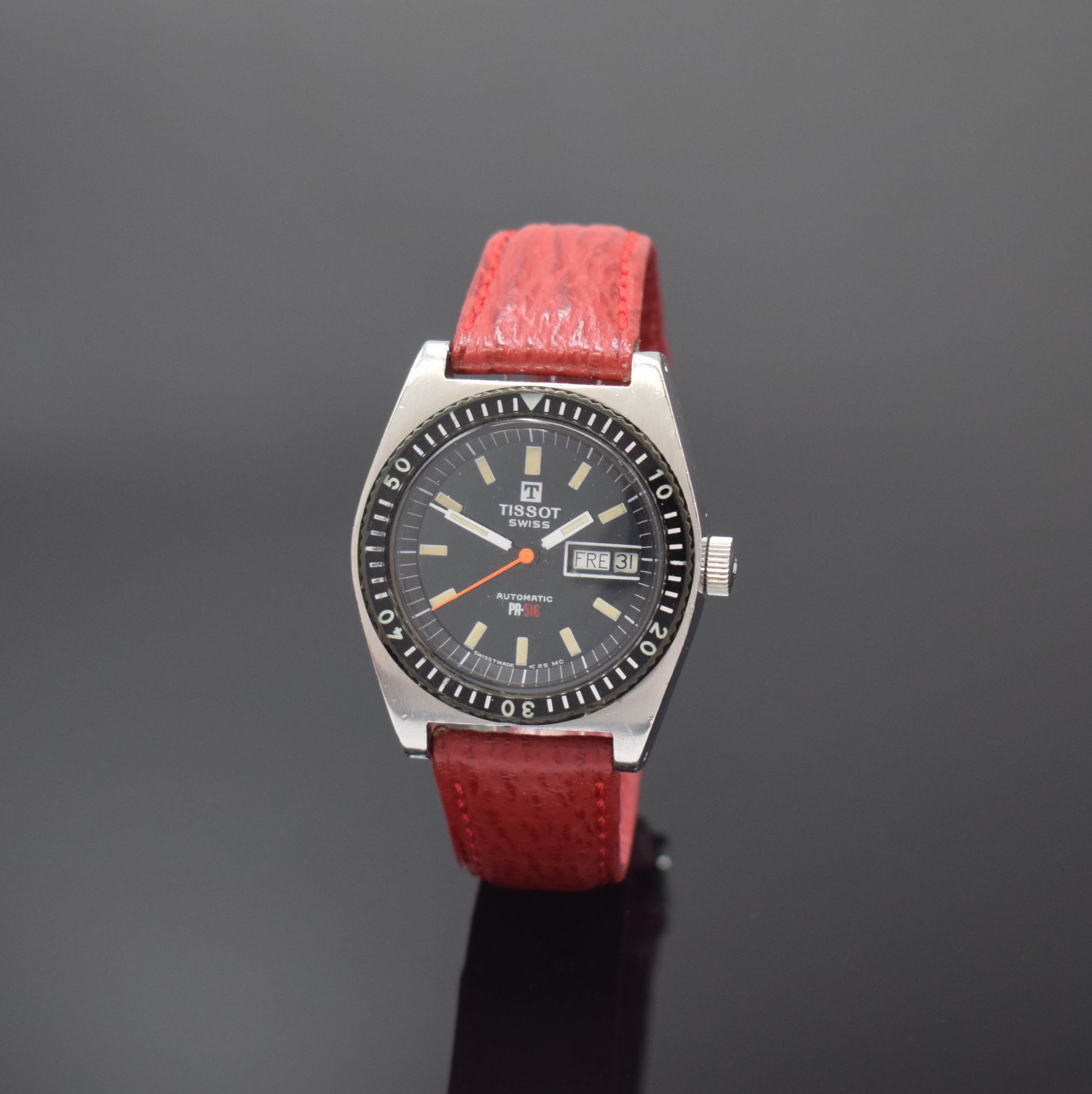 TISSOT Herrenarmbanduhr PR 516 Referenz 4662-1X, Schweiz um 1970, Automatik, Edelstahlgeh., Boden verschr., Lünette m. 60er Teilung nicht drehb., ...