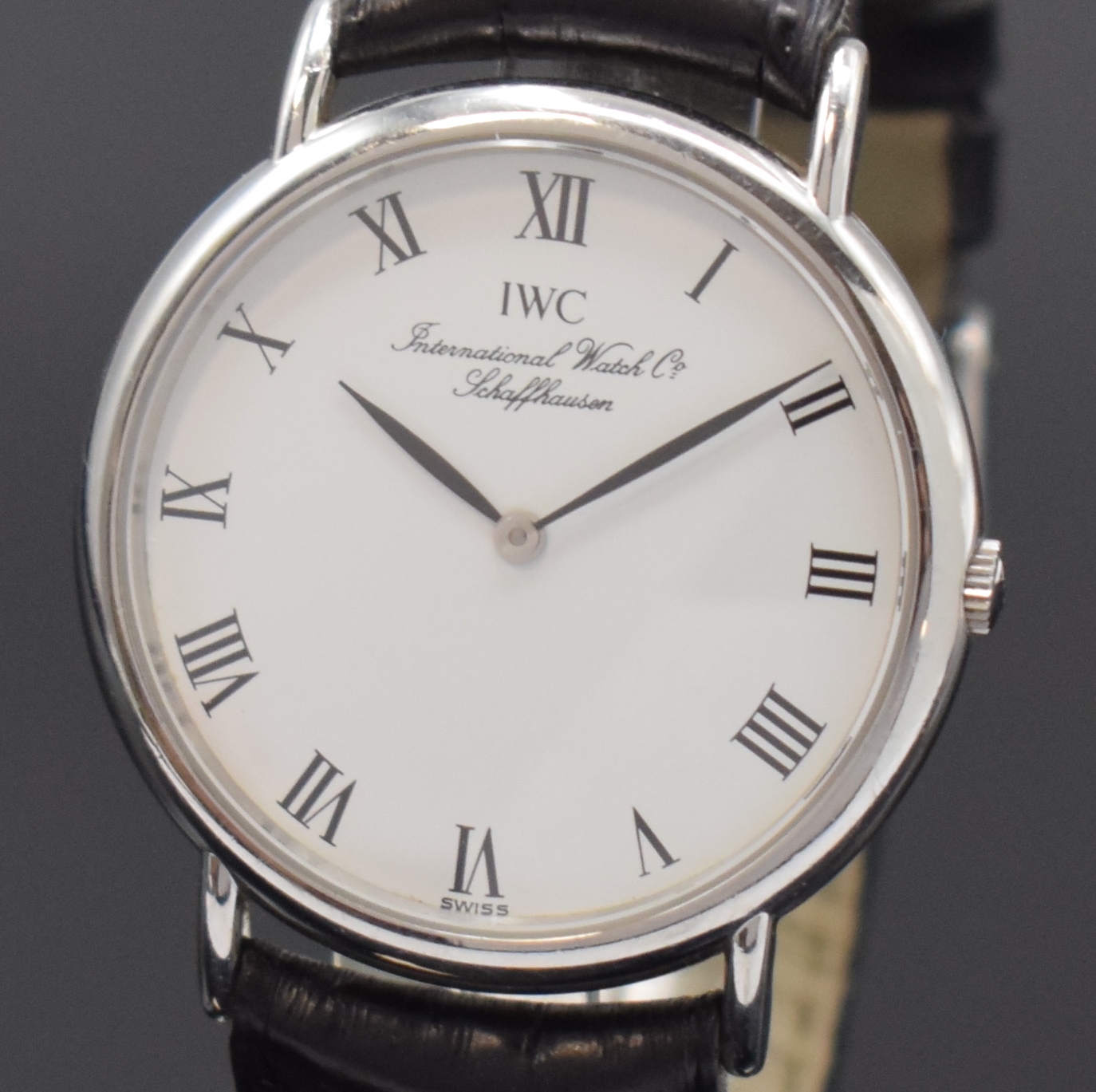 Detail a: IWC Portofino Armbanduhr in Stahl Referenz 3331, Schweiz um 1995, quarz, Boden 4-fach verschr. (1x Schr. def./zu ers.), weißes Zifferbl. m. röm. ...
