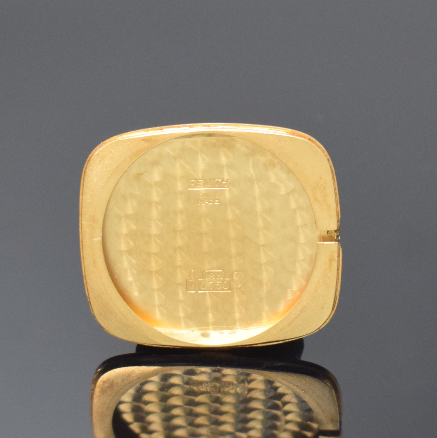 Detail d: ZENITH Armbanduhr in GG 750/000, Schweiz um 1975, Handaufzug, Boden aufgedr., champagnerfarb. Zifferbl. dell., aufgel. Std.-Ind., geschw. Zeiger, ...