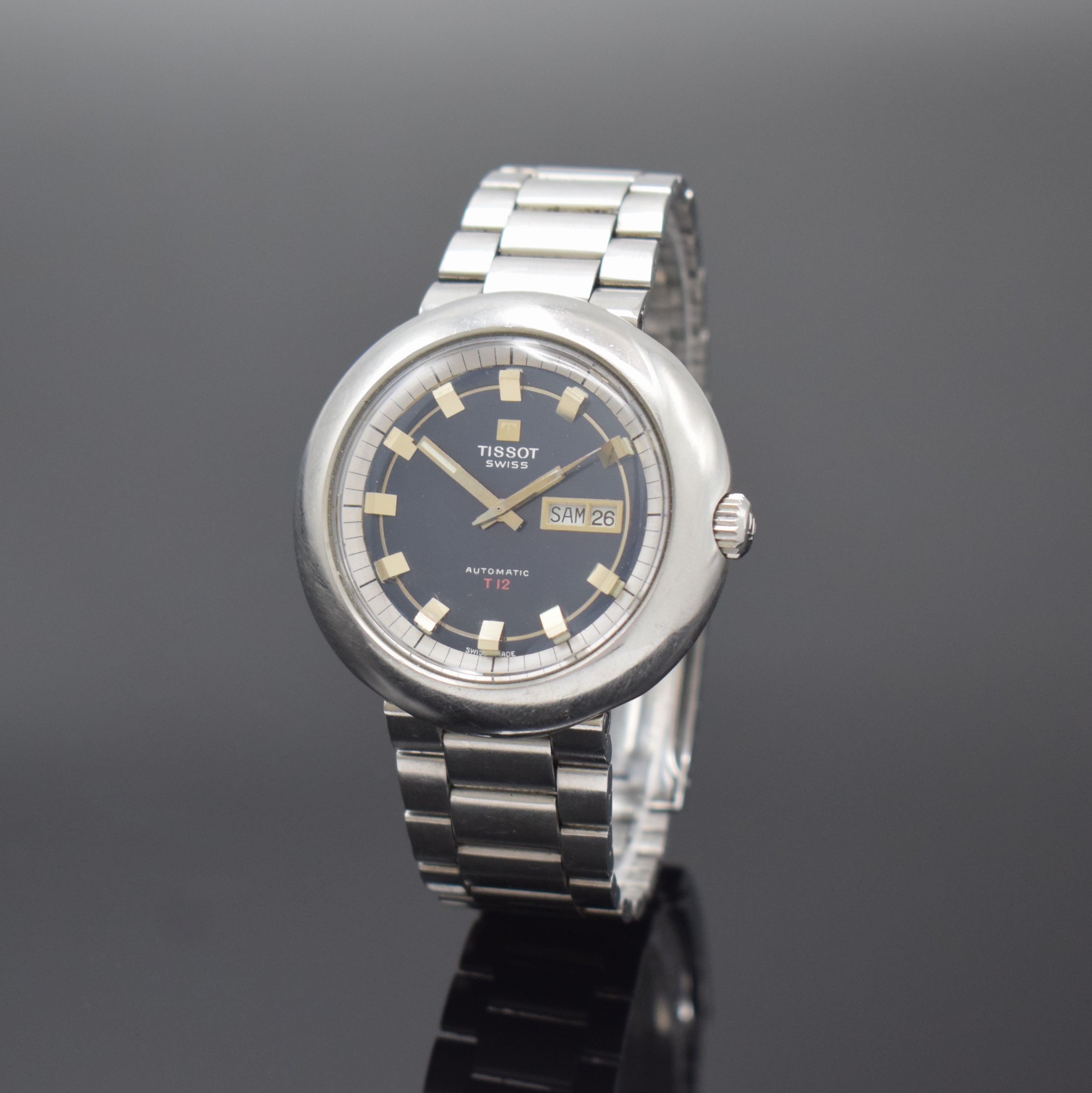 TISSOT seltene, übergroße Herrenarmbanduhr T 12 Referenz 46643 an original Gay Freres Gliederband, Automatik, Schweiz um 1971, Boden verschr., ...