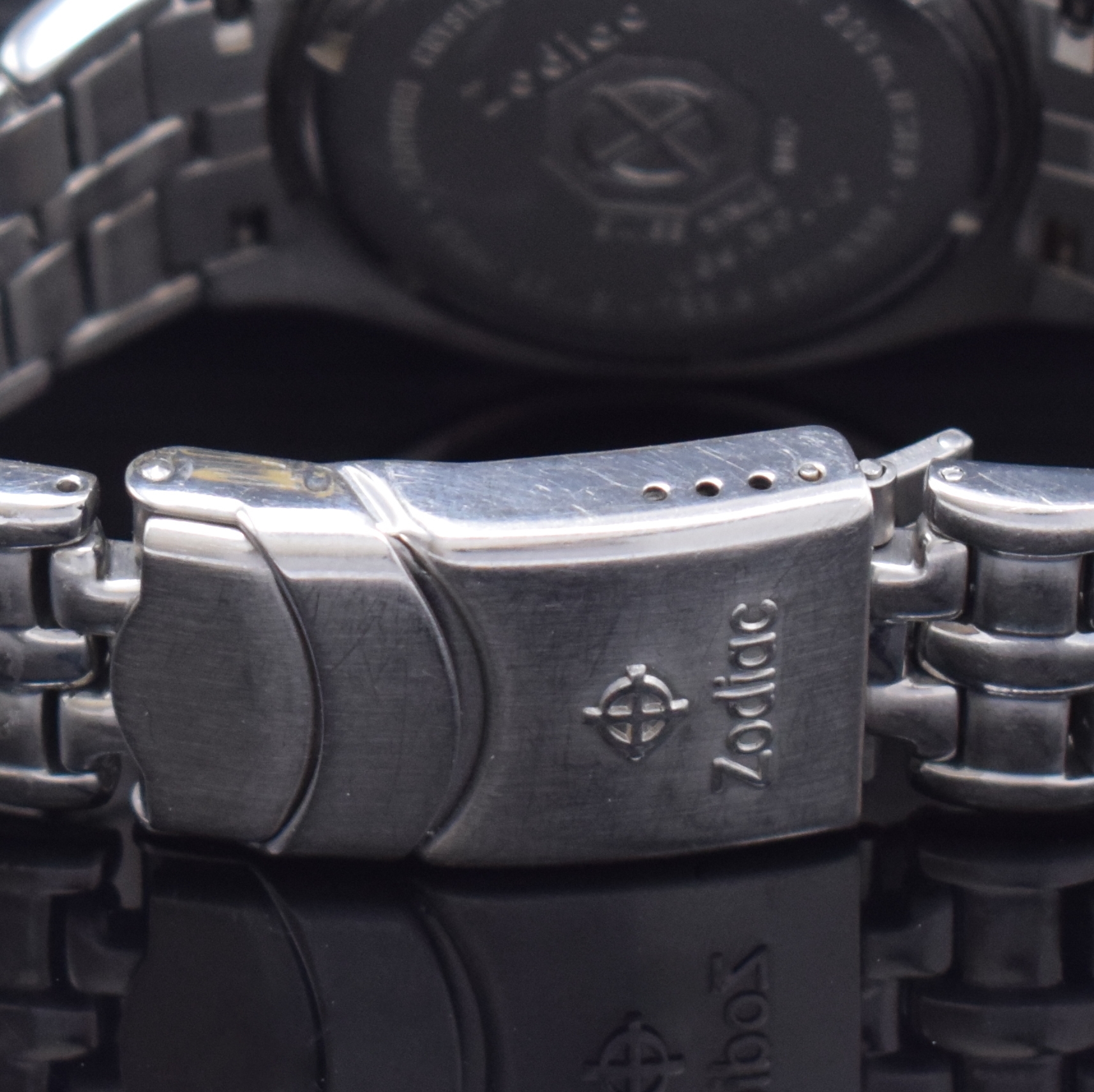 Detail d: ZODIAC Herrenarmbanduhr Sea Wolf Referenz 506.50.40, quarz, Schweiz 1990er Jahre, Edelstahlgeh. inkl. Gliederband m. Faltschl. und ...