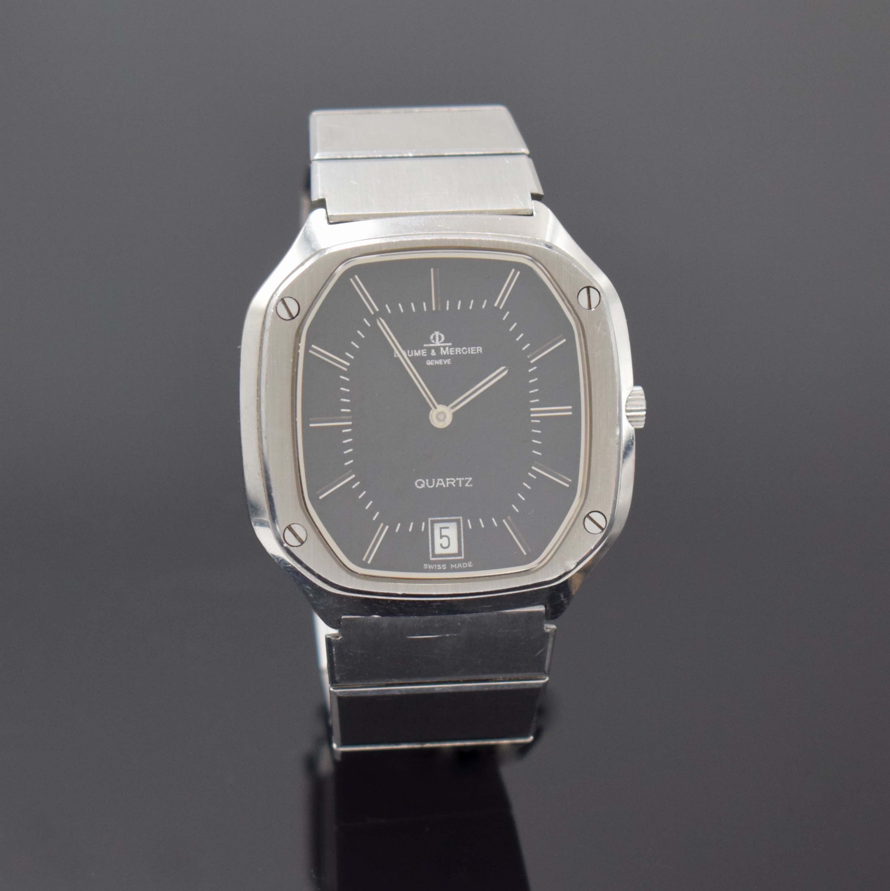 Detail b: BAUME & MERCIER Armbanduhr Referenz 4100, quarz, Schweiz um 1985, Edelstahlgeh. inkl. Gliederband m. Faltschl., Boden aufgedr., schwarzes Zifferbl., ...