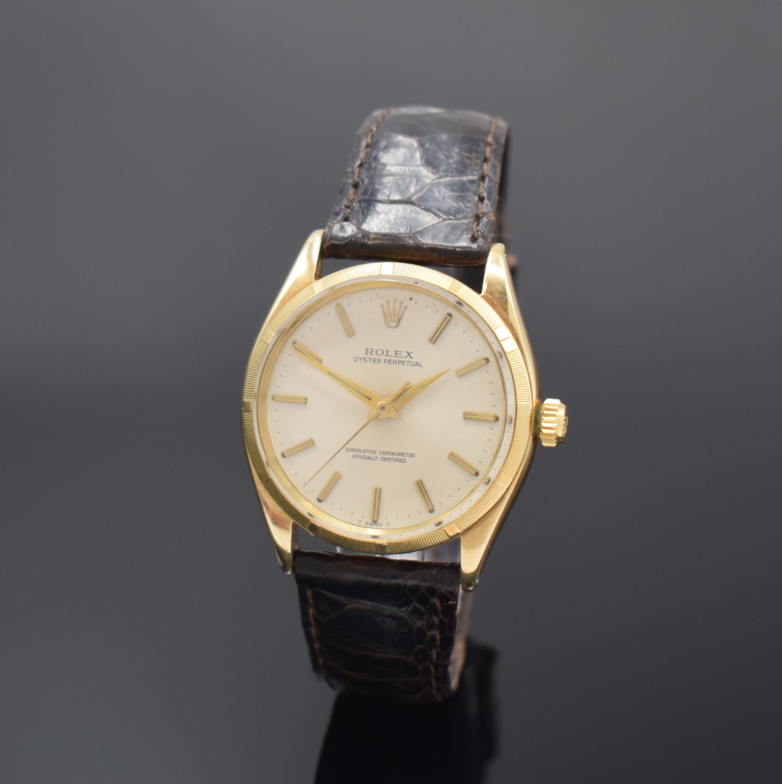 ROLEX Armbanduhr Oyster Perpetual 34 Referenz 1003 in GG 585/000, Schweiz um 1960, Automatik, Chronometer der Superlative inkl. Lederband m. orig. ...