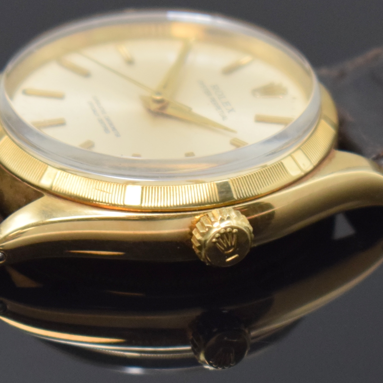 Detail d: ROLEX Armbanduhr Oyster Perpetual 34 Referenz 1003 in GG 585/000, Schweiz um 1960, Automatik, Chronometer der Superlative inkl. Lederband m. orig. ...