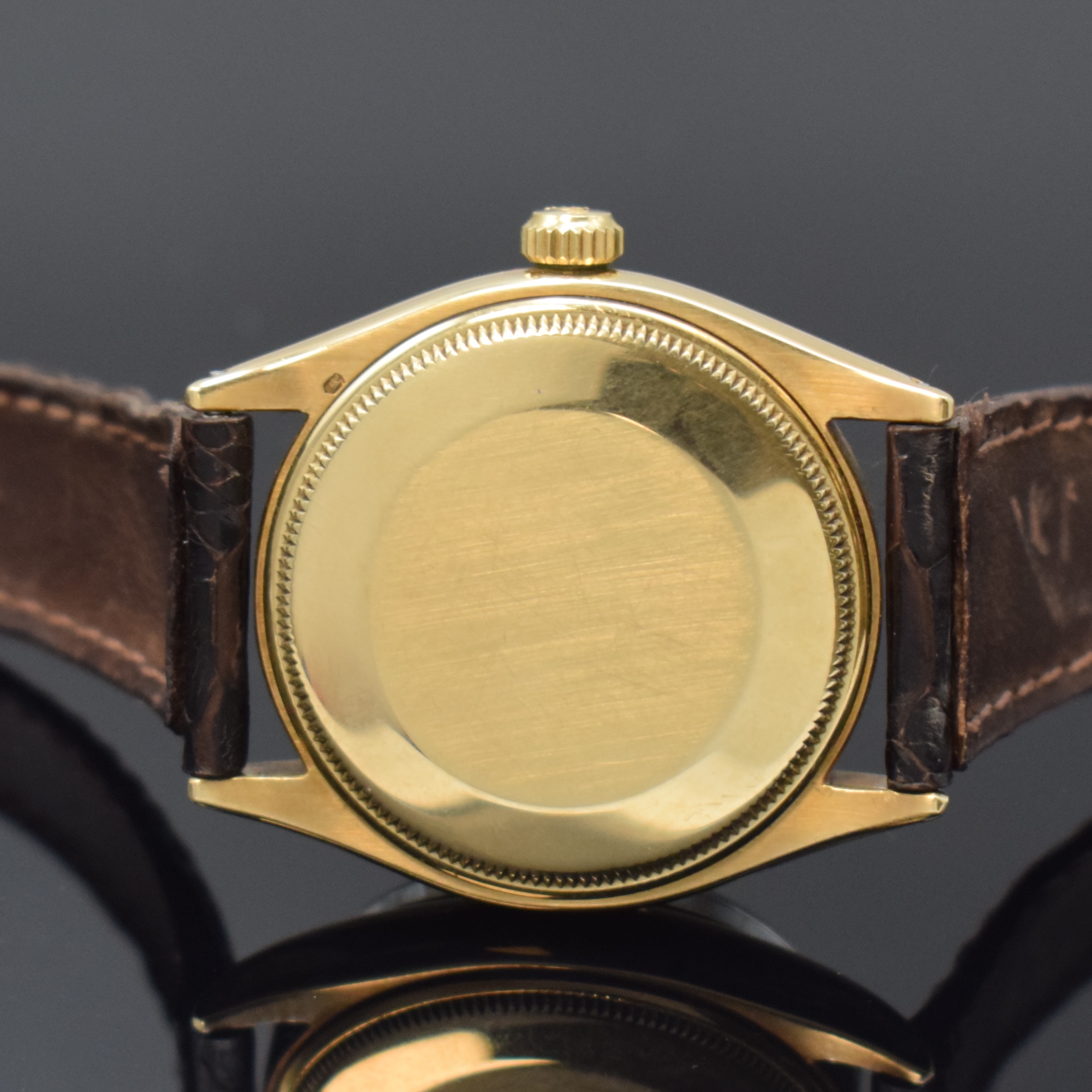 Detail e: ROLEX Armbanduhr Oyster Perpetual 34 Referenz 1003 in GG 585/000, Schweiz um 1960, Automatik, Chronometer der Superlative inkl. Lederband m. orig. ...