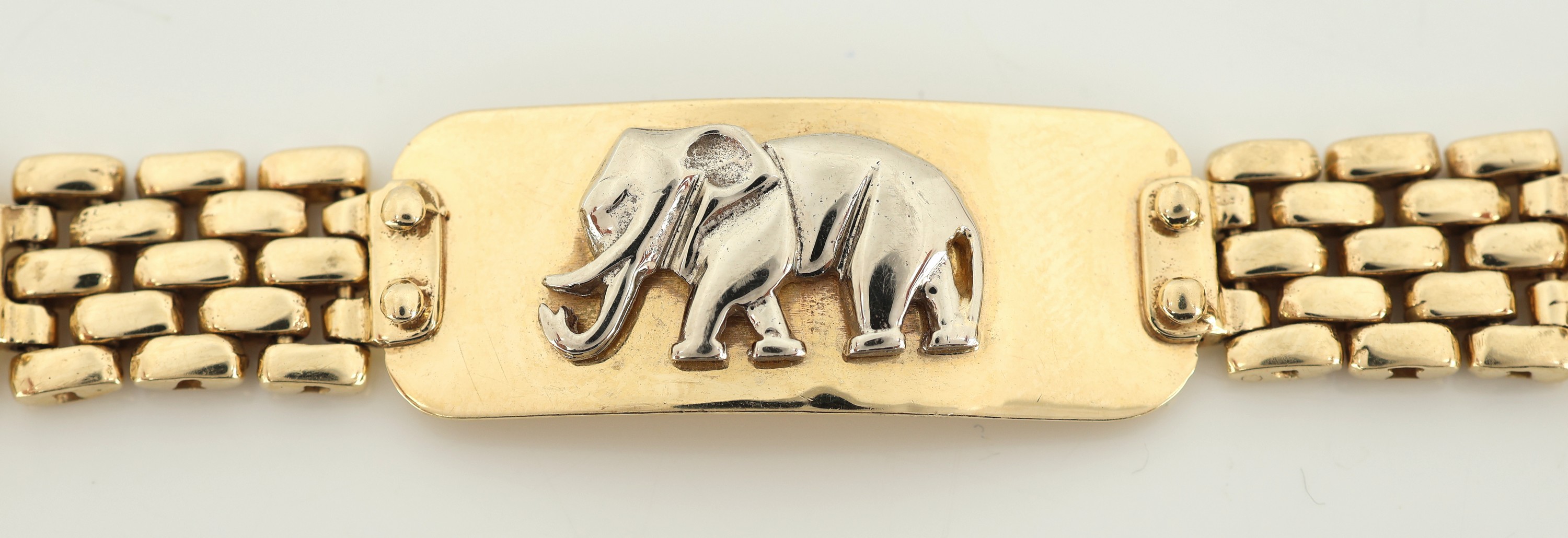 Detail b: 14 kt Gold Armband "Elefant", GG/WG 585/000, 4 aufgelegte Elefanten in WG, L. ca. 19.5 cm, runde Karabinerschließe, ca. 29.9 g