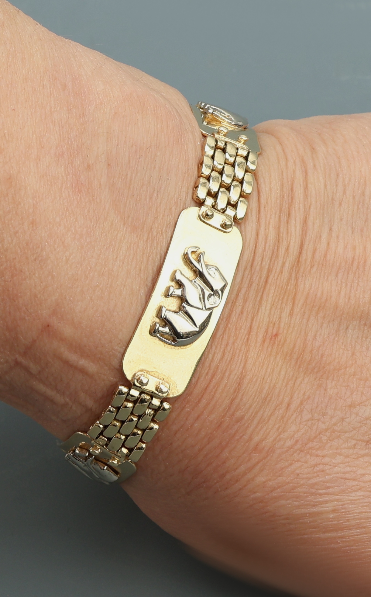 Detail f: 14 kt Gold Armband "Elefant", GG/WG 585/000, 4 aufgelegte Elefanten in WG, L. ca. 19.5 cm, runde Karabinerschließe, ca. 29.9 g