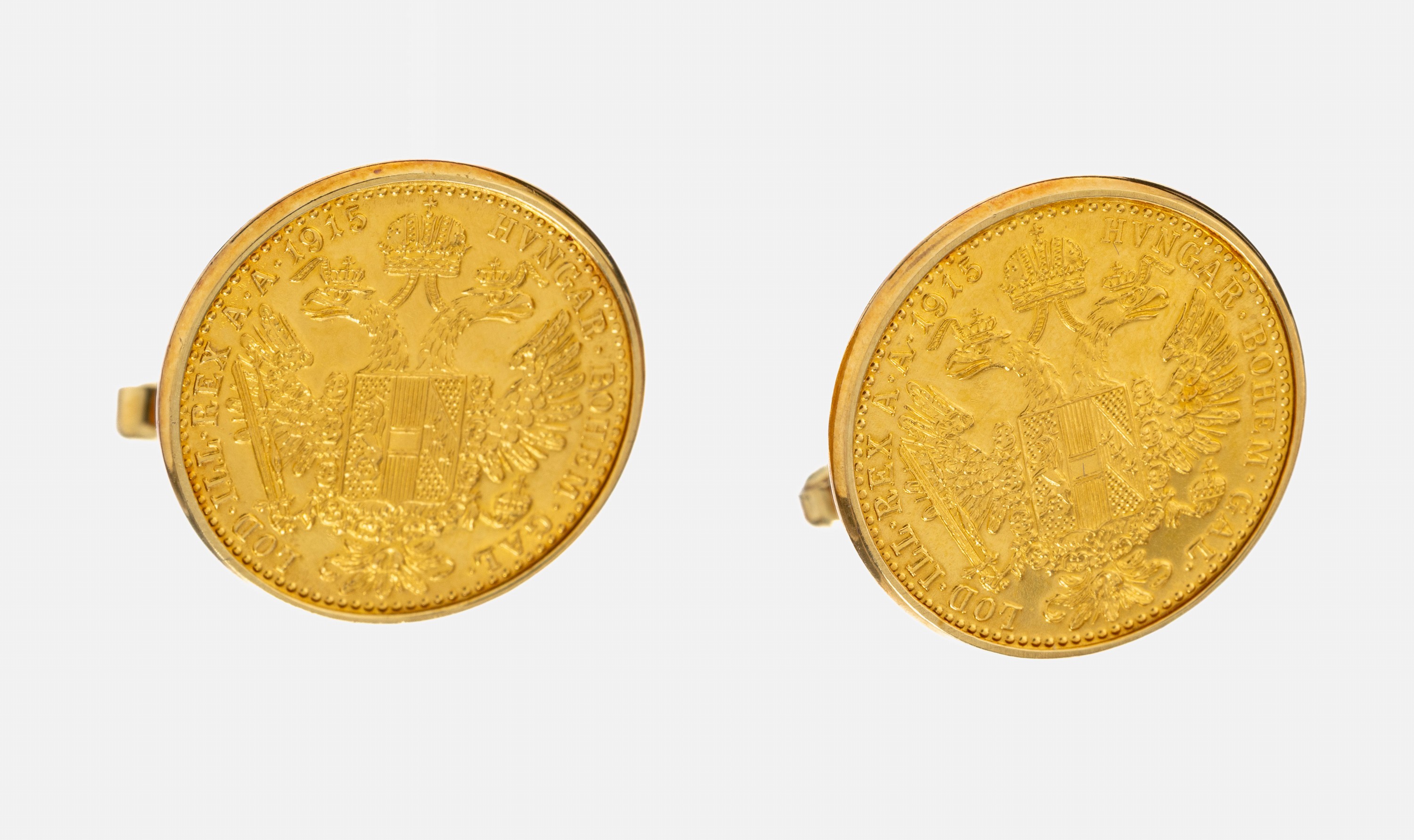 Paar 14 kt Gold Manschettenknöpfe mit Münzeinlage, GG 585/000/Dukatengold, Münzeinlage: 4 Dukaten 1915 offizielle Nachprägung, total ca. 15.6 g