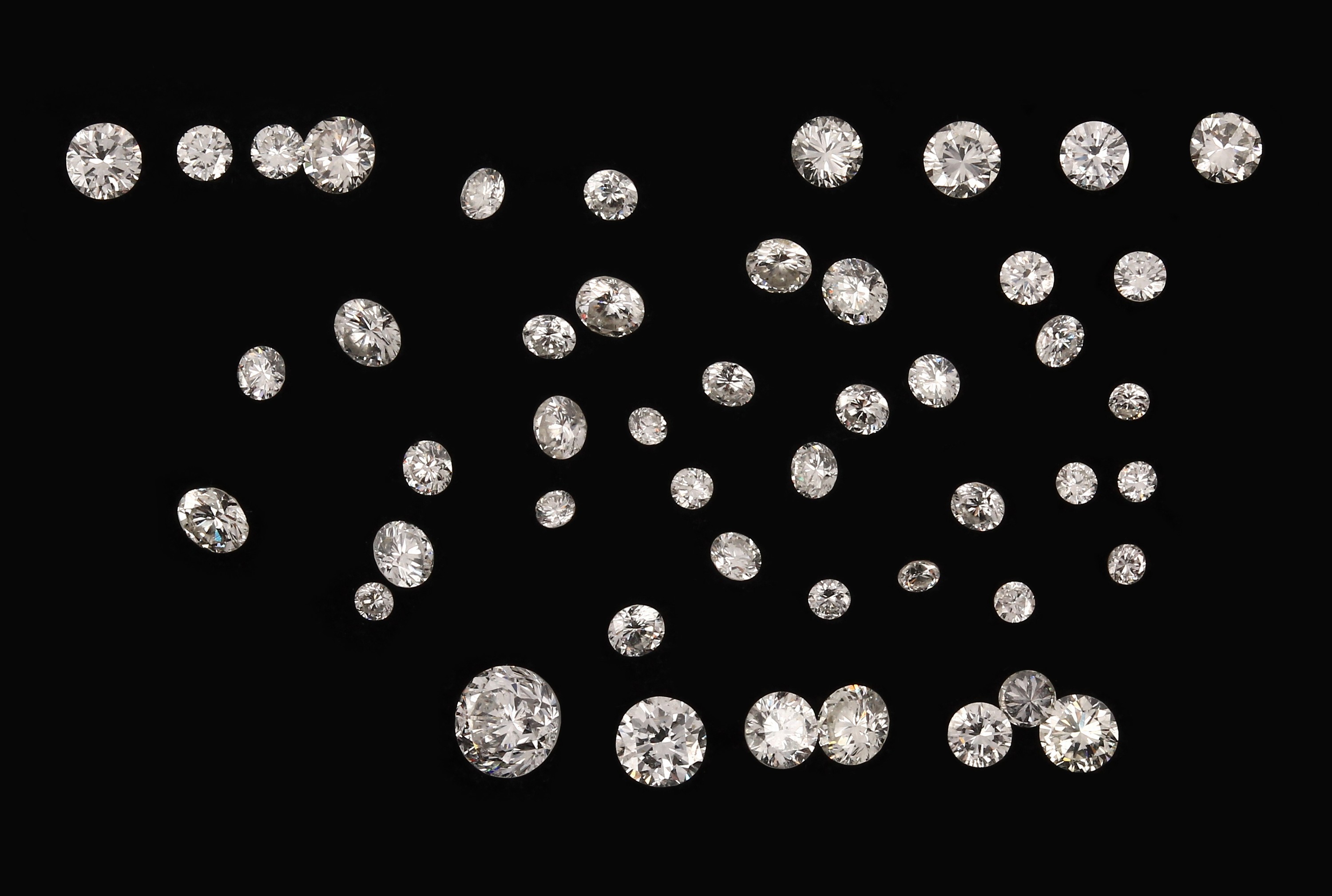 Lot lose Brillanten zus. 3.89 ct Weiß-get.Weiß/si-p