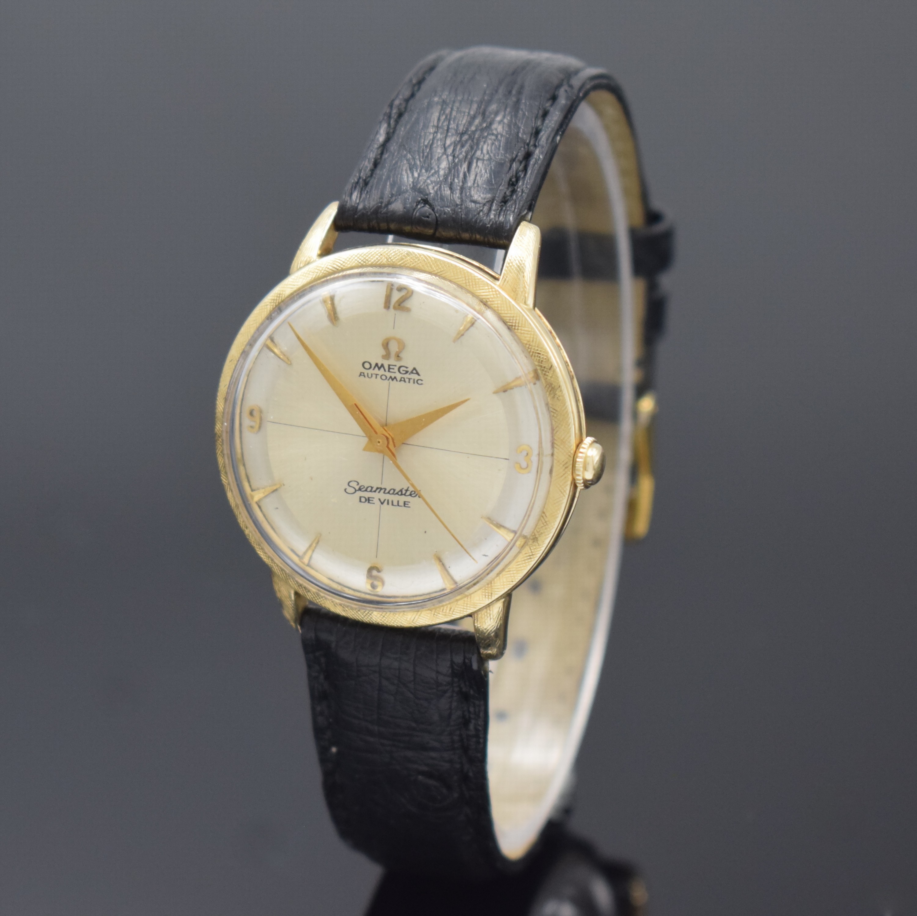 OMEGA Herrenarmbanduhr mit Hammerautomatik in GG 585/000 Referenz G6518, Schweiz / USA um 1949, Automatik, Boden und Glasrand aufgedr., silb. ...