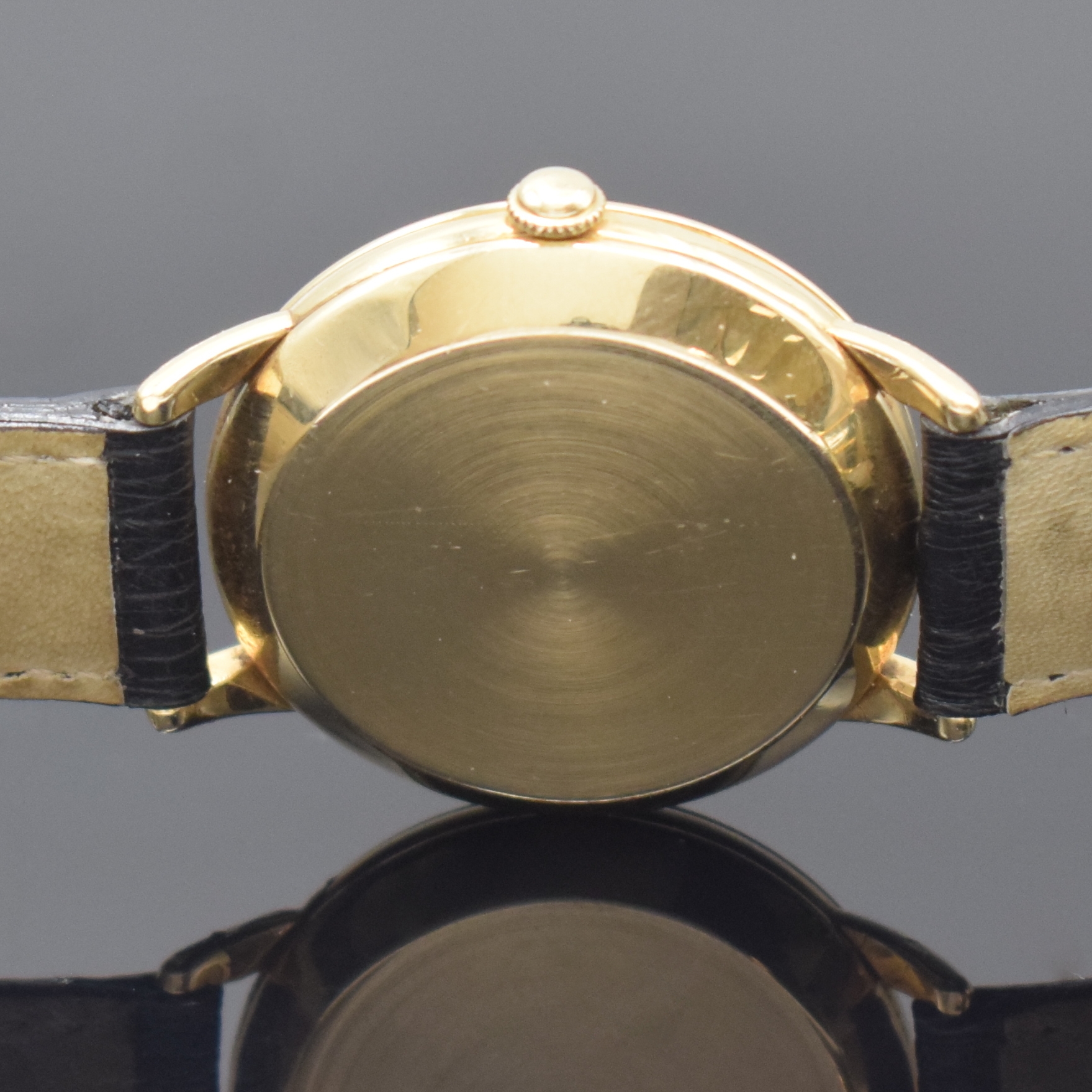 Detail e: OMEGA Herrenarmbanduhr mit Hammerautomatik in GG 585/000 Referenz G6518, Schweiz / USA um 1949, Automatik, Boden und Glasrand aufgedr., silb. ...