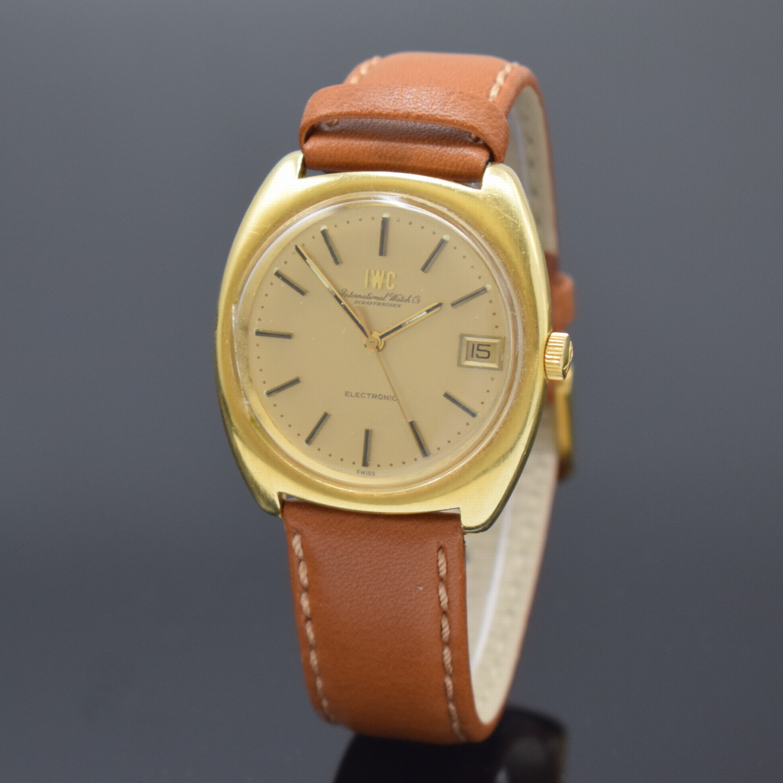 IWC Herrenarmbanduhr Modell Electronic in GG 750/000, Schweiz um 1971, Stimmgabelschwinger, massives Geh., Boden aufgedr., gold. Zifferbl. m. aufgel. ...