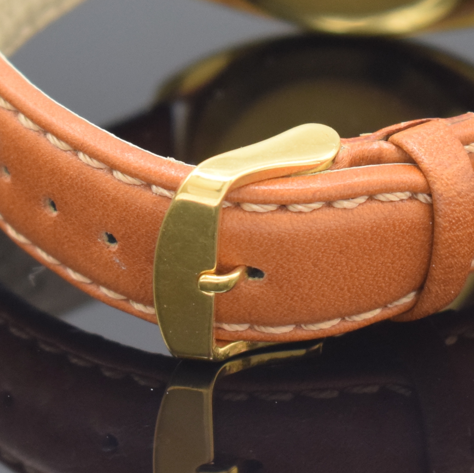 Detail d: IWC Herrenarmbanduhr Modell Electronic in GG 750/000, Schweiz um 1971, Stimmgabelschwinger, massives Geh., Boden aufgedr., gold. Zifferbl. m. aufgel. ...