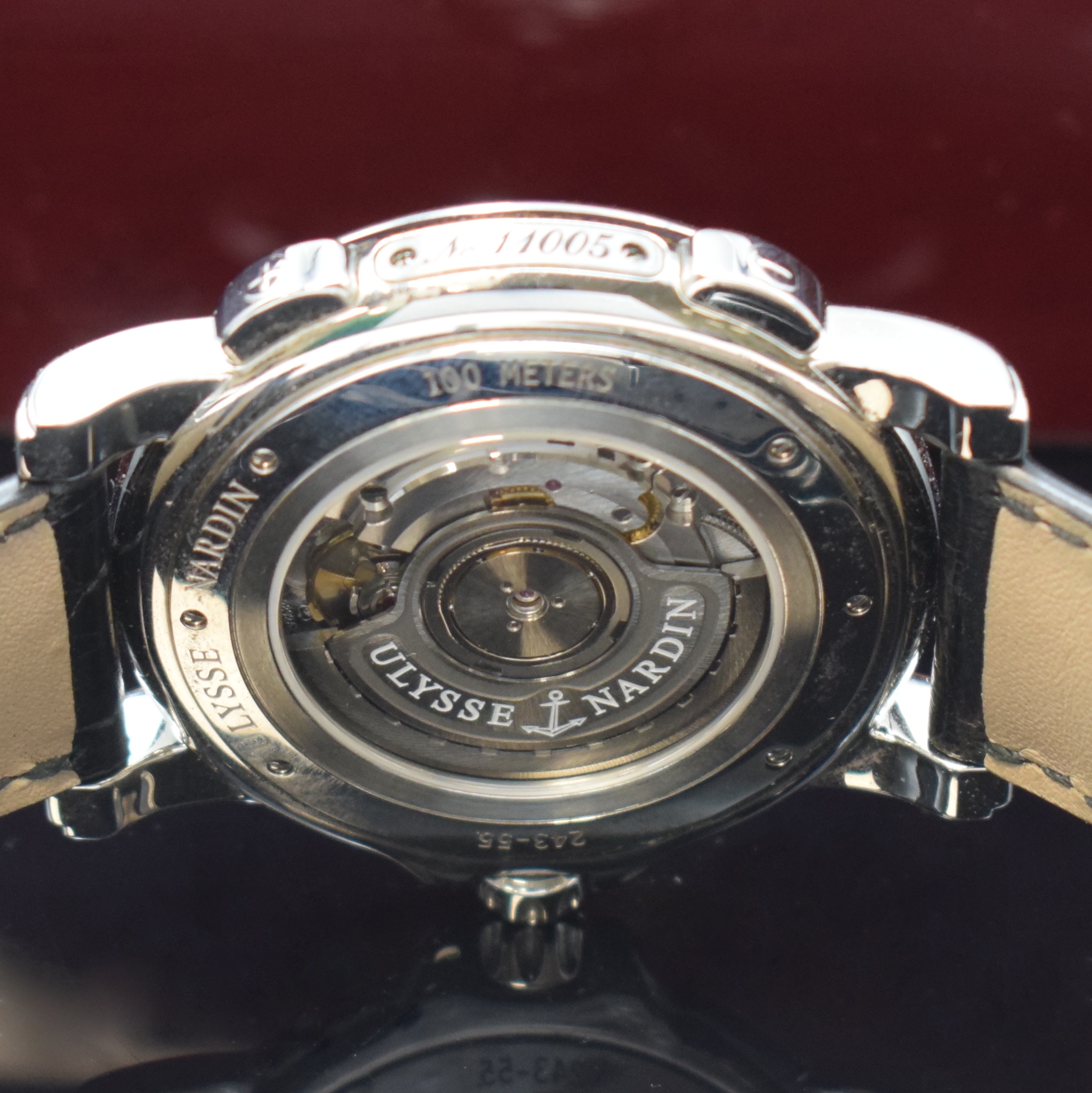 Detail f: ULYSSE NARDIN Dual Time Herrenarmbanduhr Referenz 243-55, Schweiz um 2015, Automatik, beids. vergl. Edelstahlgeh., Boden 6-fach verschr., Krone ...