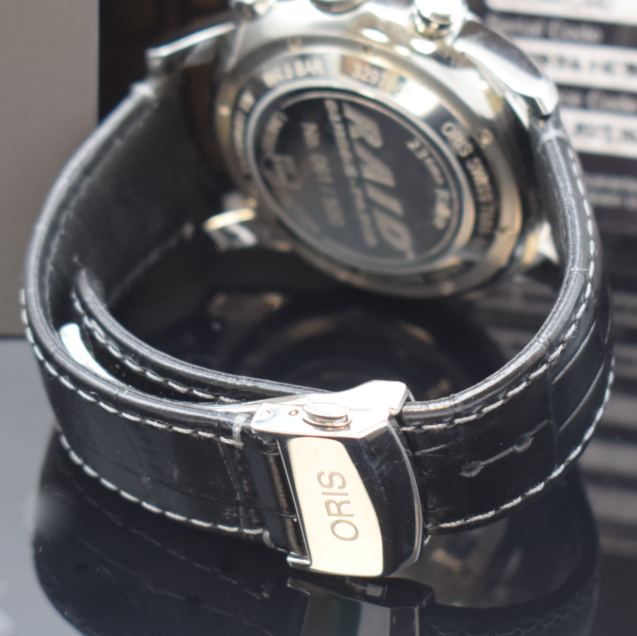 Detail b: ORIS Raid auf 500 Stück limitierter Armbandchronograph Referenz 7686-84, Schweiz um 2013, Automatik, Edelstahlgeh. inkl. orig. Lederband m. ...