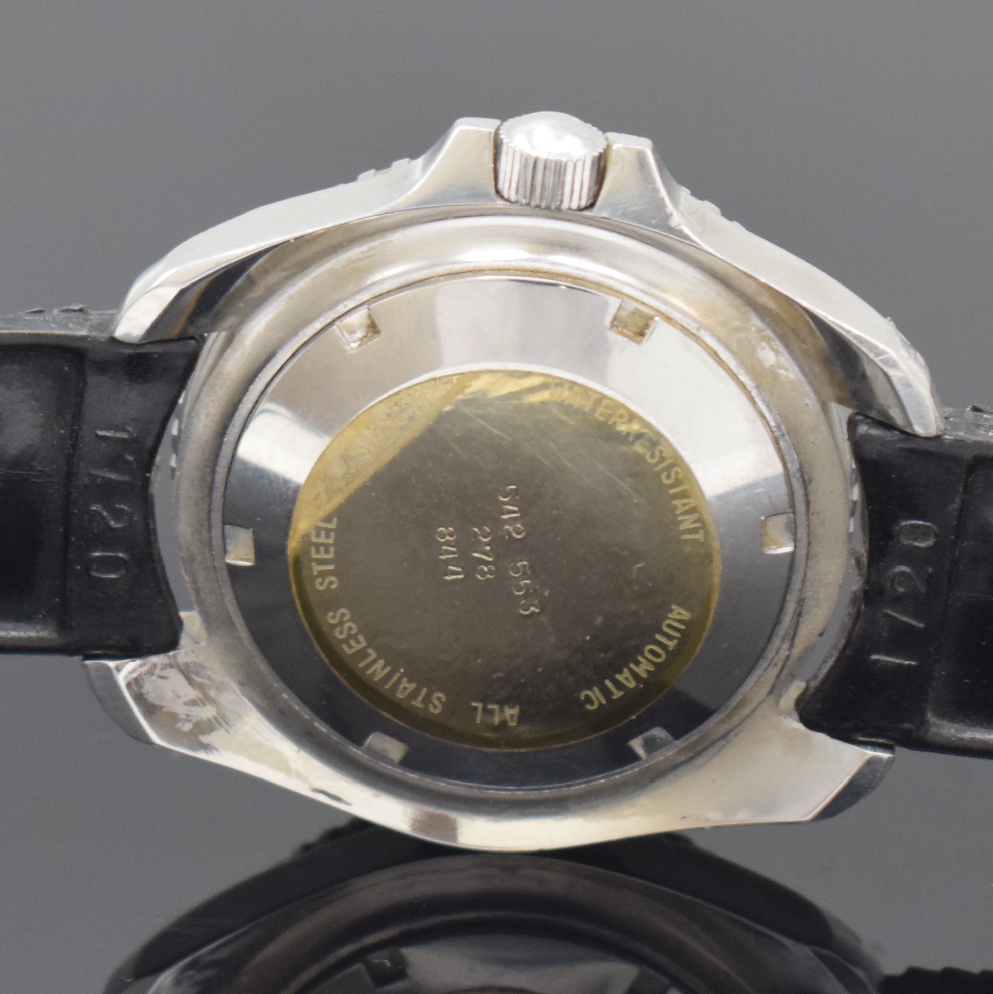 Detail f: DUGENA Monza Herrenarmbanduhr in Stahl, Schweiz um 1970, Automatik, Boden u. Krone verschr., Lünette m. 60er Teilung eins. drehb., schwarzes ...