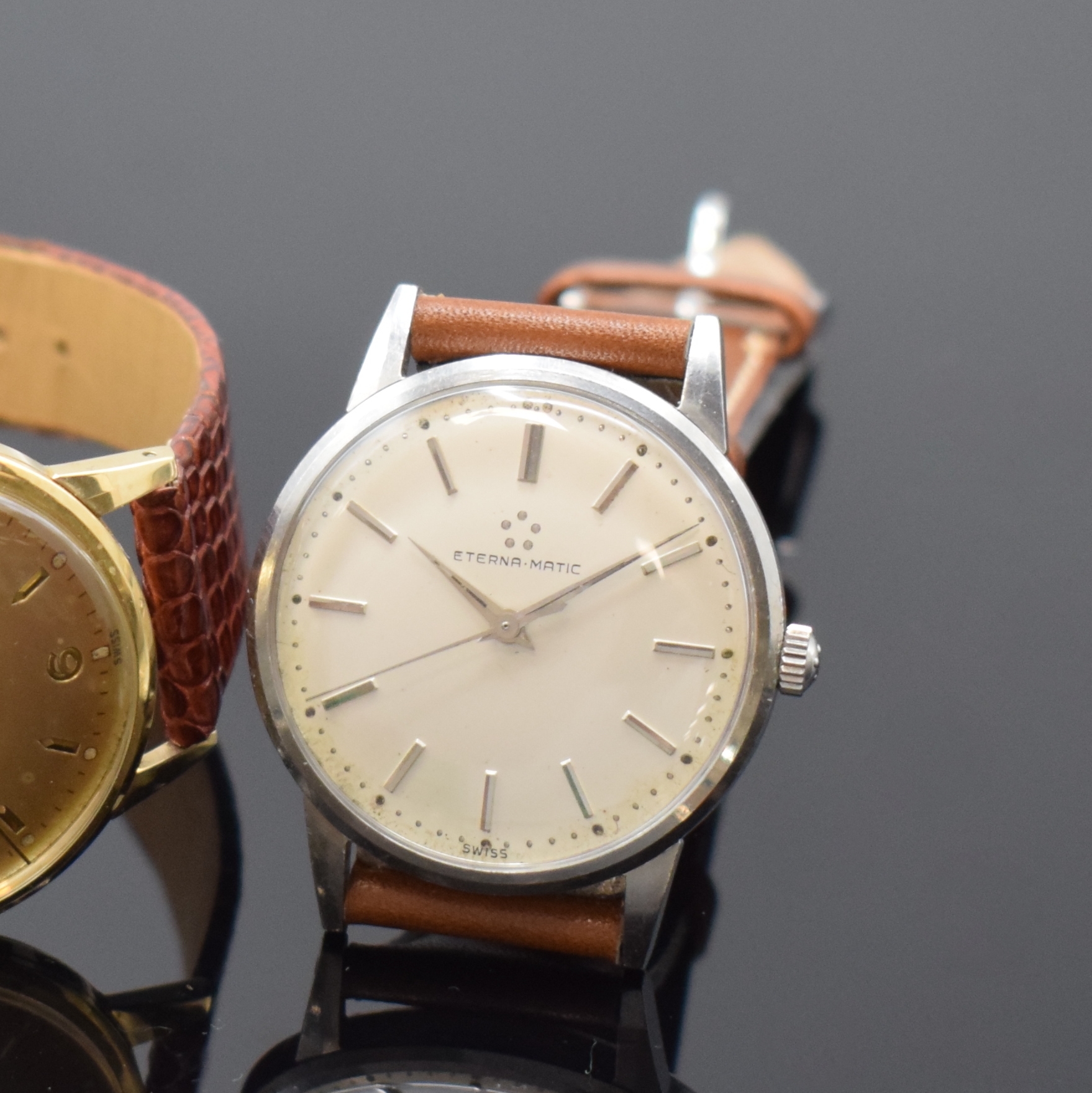 Detail a: ETERNA-MATIC 2 Armbanduhren in GG 585/000 und Stahl, Schweiz um 1955, Böden aufgedr., 1 x gold. Zifferbl. altersbed. pat. und 1 x silb. Zifferbl., ...