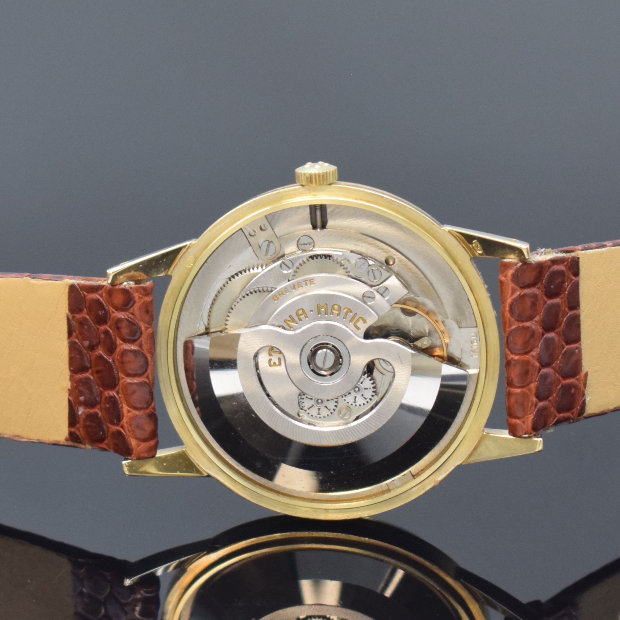Detail e: ETERNA-MATIC 2 Armbanduhren in GG 585/000 und Stahl, Schweiz um 1955, Böden aufgedr., 1 x gold. Zifferbl. altersbed. pat. und 1 x silb. Zifferbl., ...