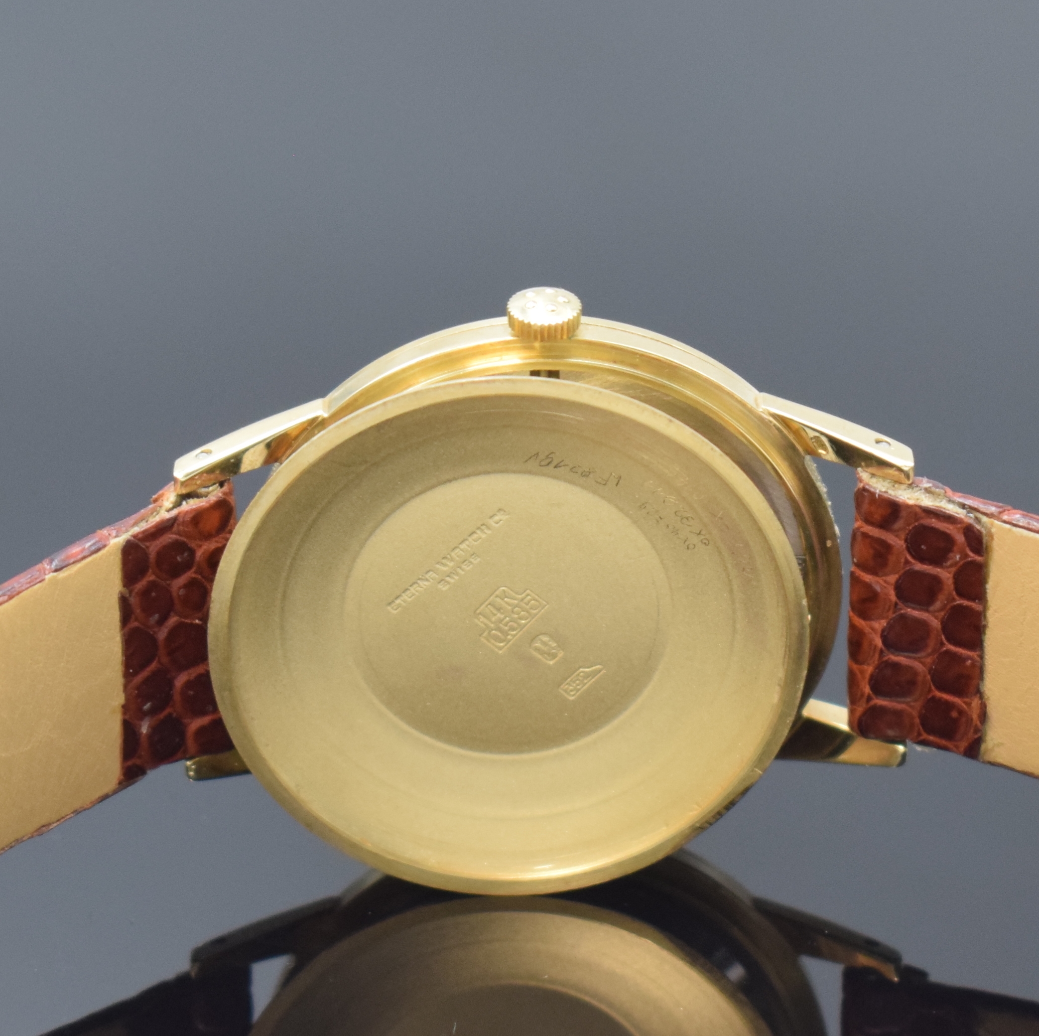 Detail g: ETERNA-MATIC 2 Armbanduhren in GG 585/000 und Stahl, Schweiz um 1955, Böden aufgedr., 1 x gold. Zifferbl. altersbed. pat. und 1 x silb. Zifferbl., ...