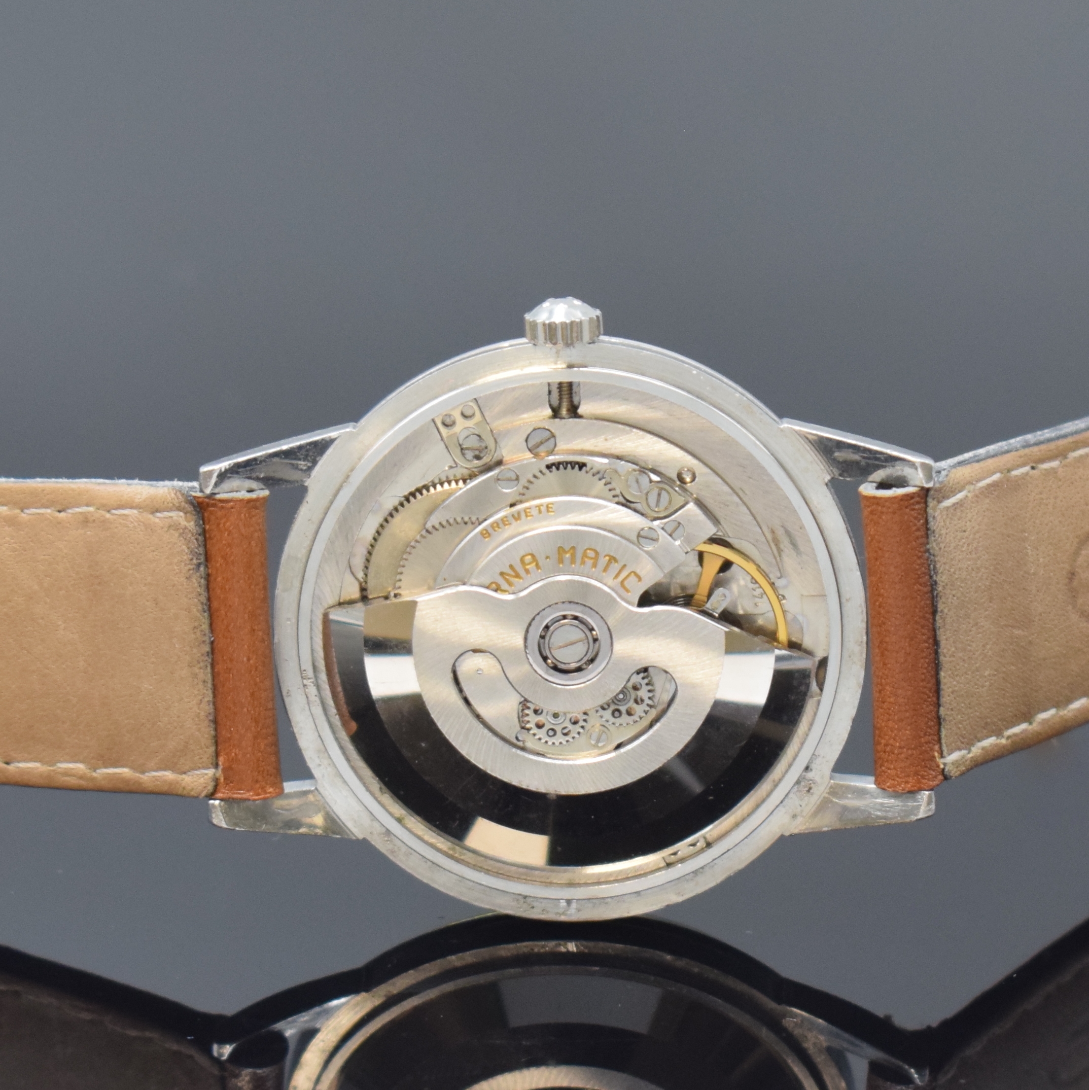 Detail h: ETERNA-MATIC 2 Armbanduhren in GG 585/000 und Stahl, Schweiz um 1955, Böden aufgedr., 1 x gold. Zifferbl. altersbed. pat. und 1 x silb. Zifferbl., ...