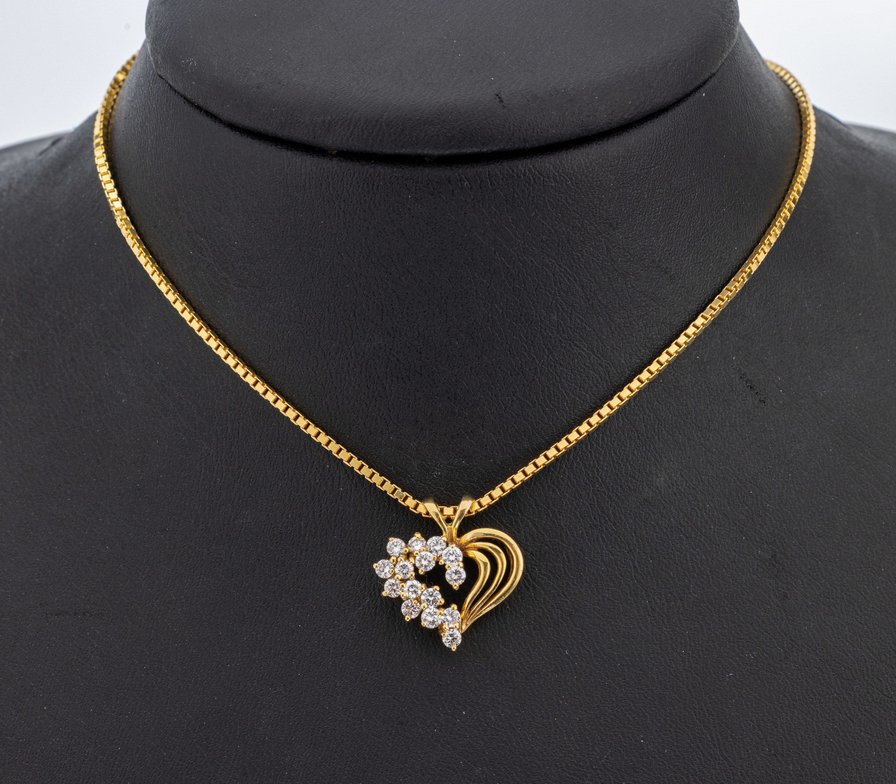 14 kt Gold Brillant-Anhänger "Herz", GG 585/000, hälftig bes. mit 15 Brillanten zus. ca. 0.70 ct Weiß/si, an Kette, L. ca. 44 cm, ...