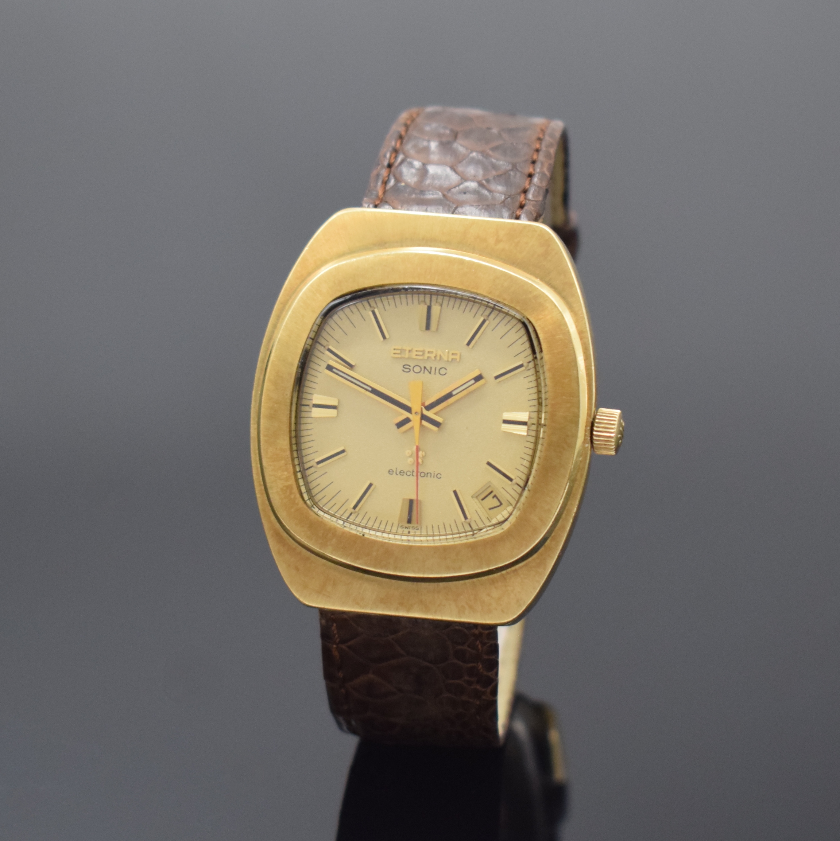 ETERNA Herrenarmbanduhr Serie Sonic in GG 750/000, Schweiz um 1972, Boden und Glasrand aufgedr., Zentralsek., gold. Zifferbl. m. aufgel. Indizes, ...
