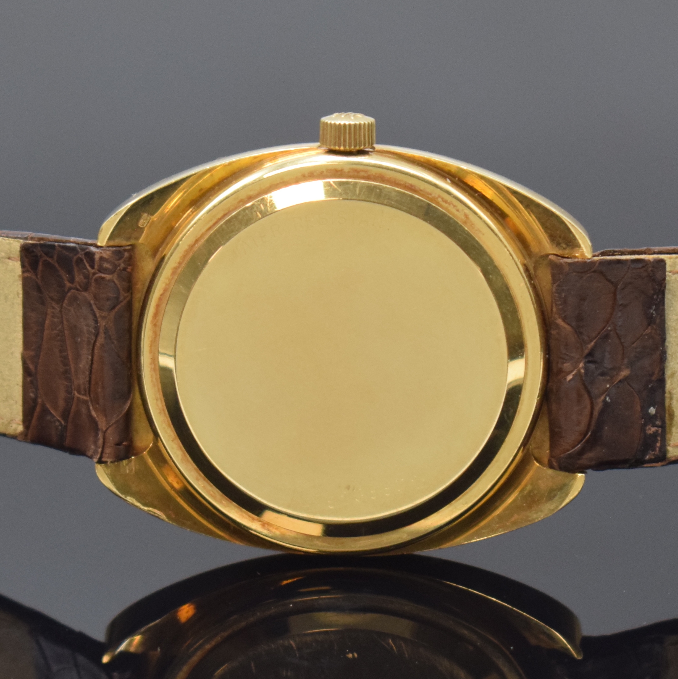 Detail c: ETERNA Herrenarmbanduhr Serie Sonic in GG 750/000, Schweiz um 1972, Boden und Glasrand aufgedr., Zentralsek., gold. Zifferbl. m. aufgel. Indizes, ...