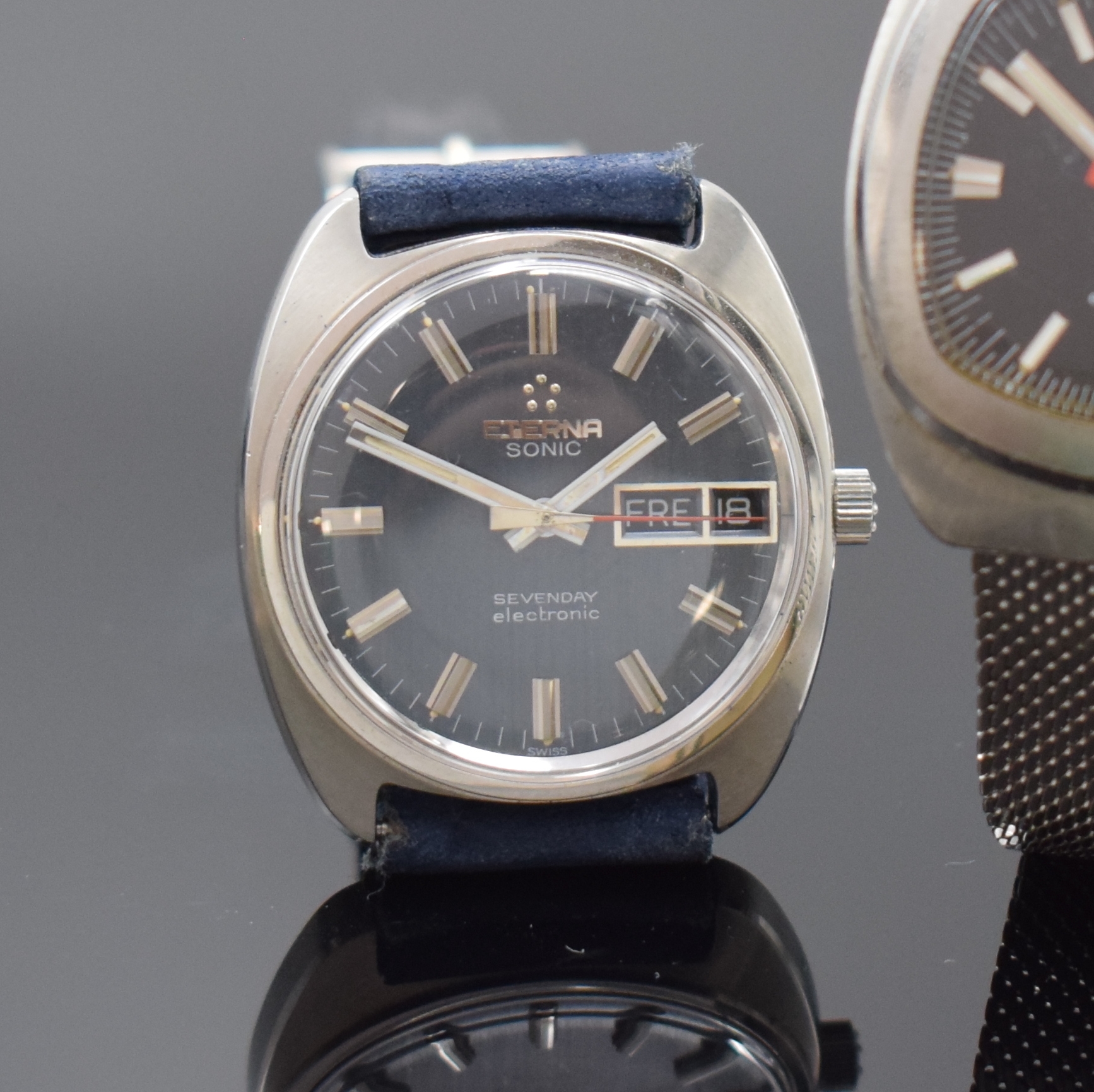 Detail b: 2 ETERNA Sonic Armbanduhren, Schweiz um 1970, Edelstahlgeh., Stimmgabelwerken, davon 1 x Sevenday m. orig. Lederband inkl. orig. Dornschl., Boden ...