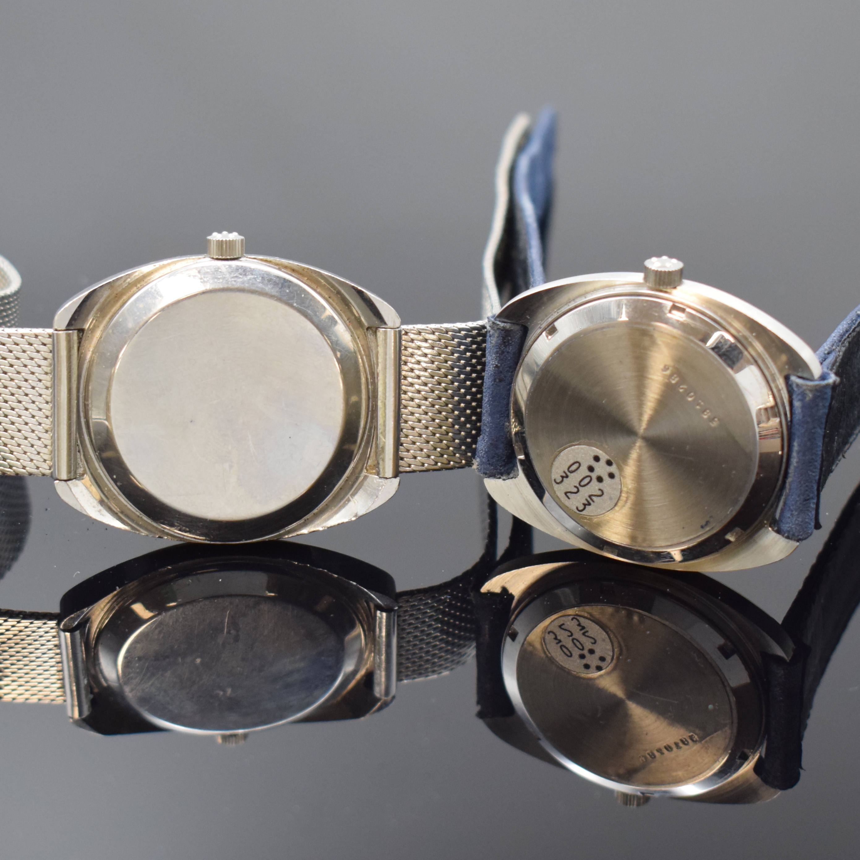 Detail e: 2 ETERNA Sonic Armbanduhren, Schweiz um 1970, Edelstahlgeh., Stimmgabelwerken, davon 1 x Sevenday m. orig. Lederband inkl. orig. Dornschl., Boden ...