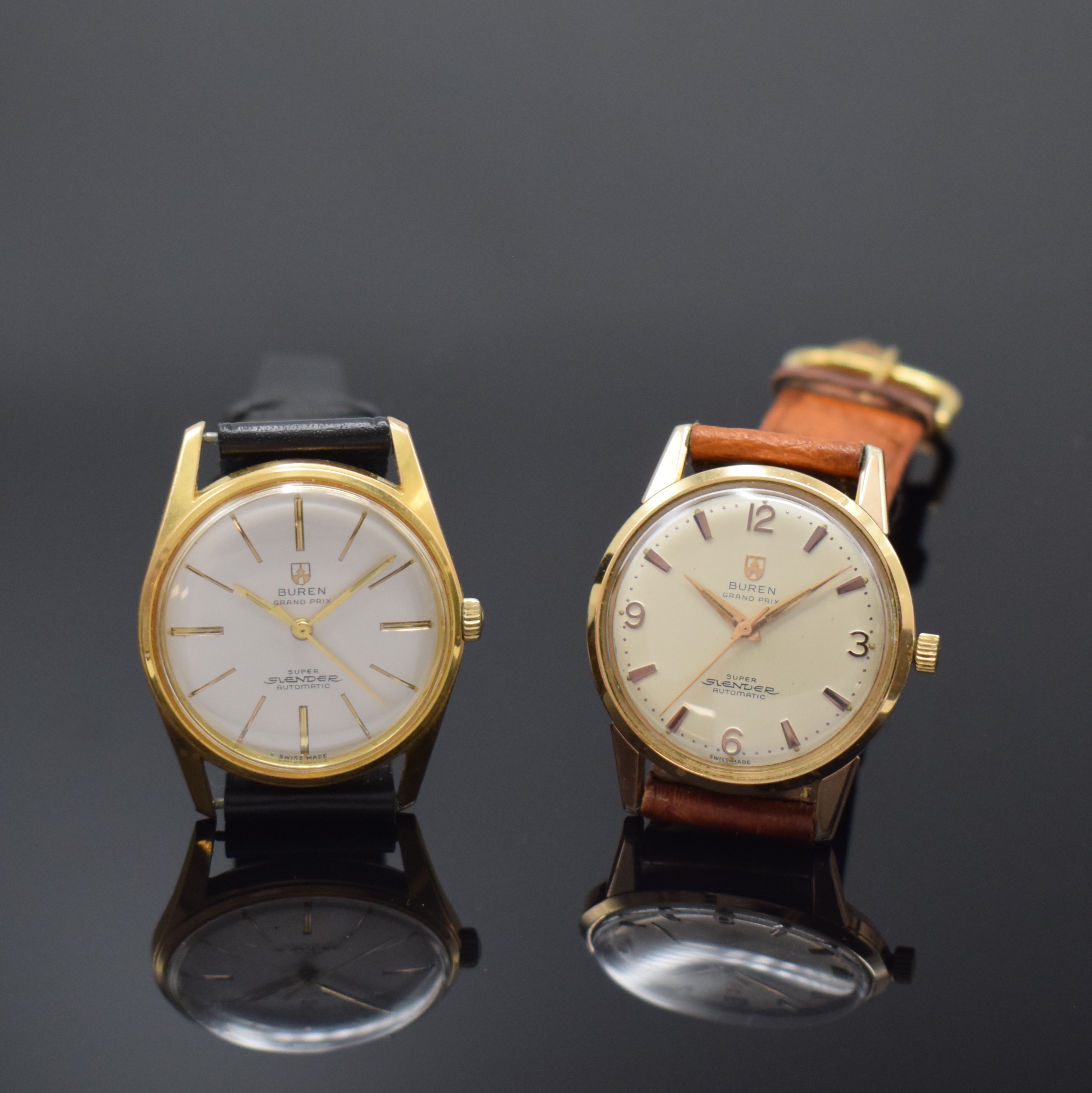 2 BUREN Herrenarmbanduhr Grand Prix Super Slender, Automatik mit Microrotor, Schweiz um 1965, verg. Metallgeh. m. verschr. Edelstahlböden, rotverg. ...