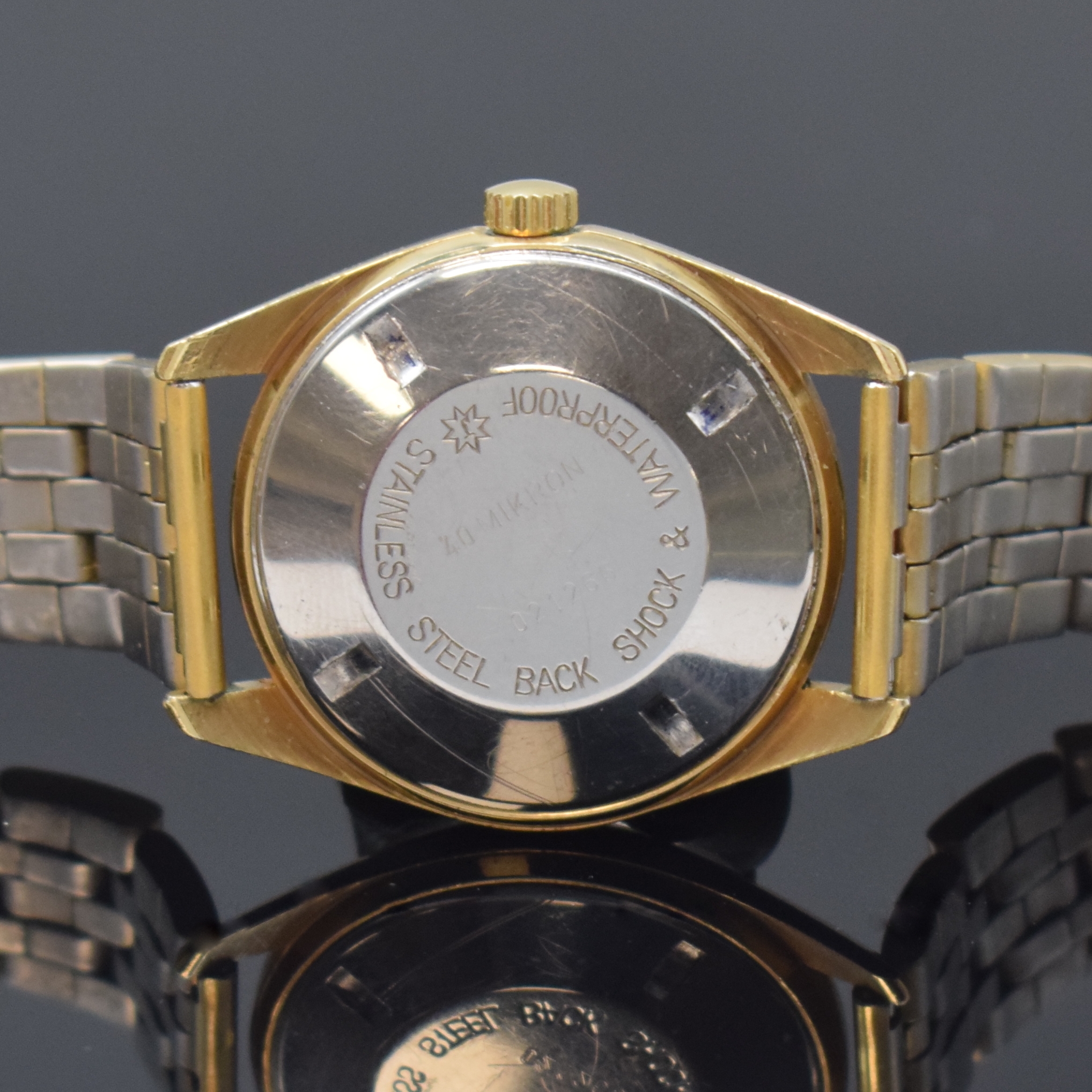 Detail c: JUNGHANS Chronometer vergoldete Herrenarmbanduhr, Deutschland um 1954, Handaufzug, Edelstahlboden verschr., neutrales Band, gold. Zifferbl. m. ...