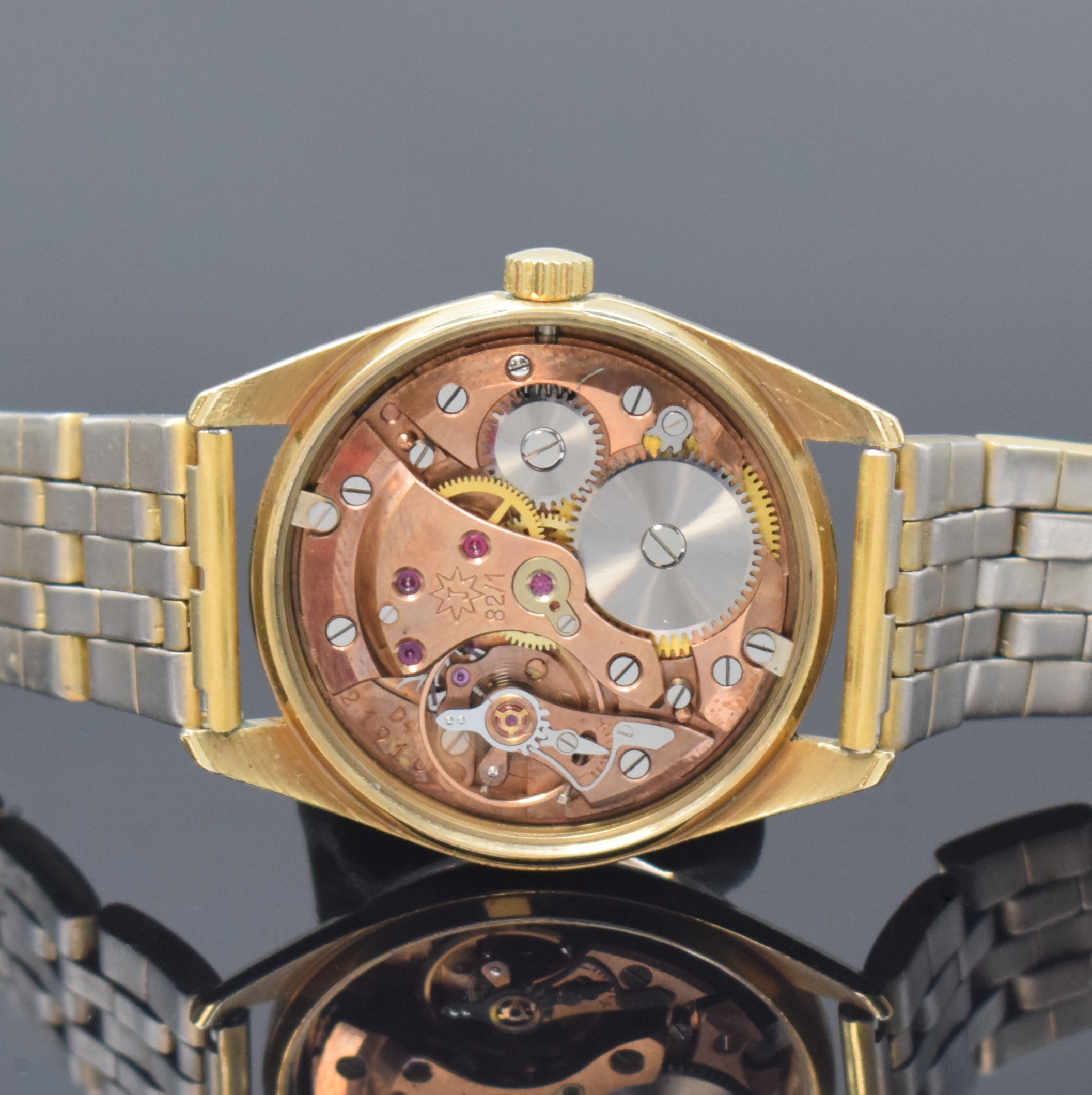 Detail d: JUNGHANS Chronometer vergoldete Herrenarmbanduhr, Deutschland um 1954, Handaufzug, Edelstahlboden verschr., neutrales Band, gold. Zifferbl. m. ...
