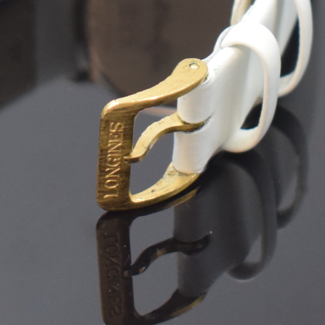 Detail b: LONGINES Les Grandes Classiques Armbanduhr, Schweiz um 1990, quarz, verg. Gehäuse, Edelstahlboden aufgedr., verg. Zifferbl. m. aufges. gold. ...