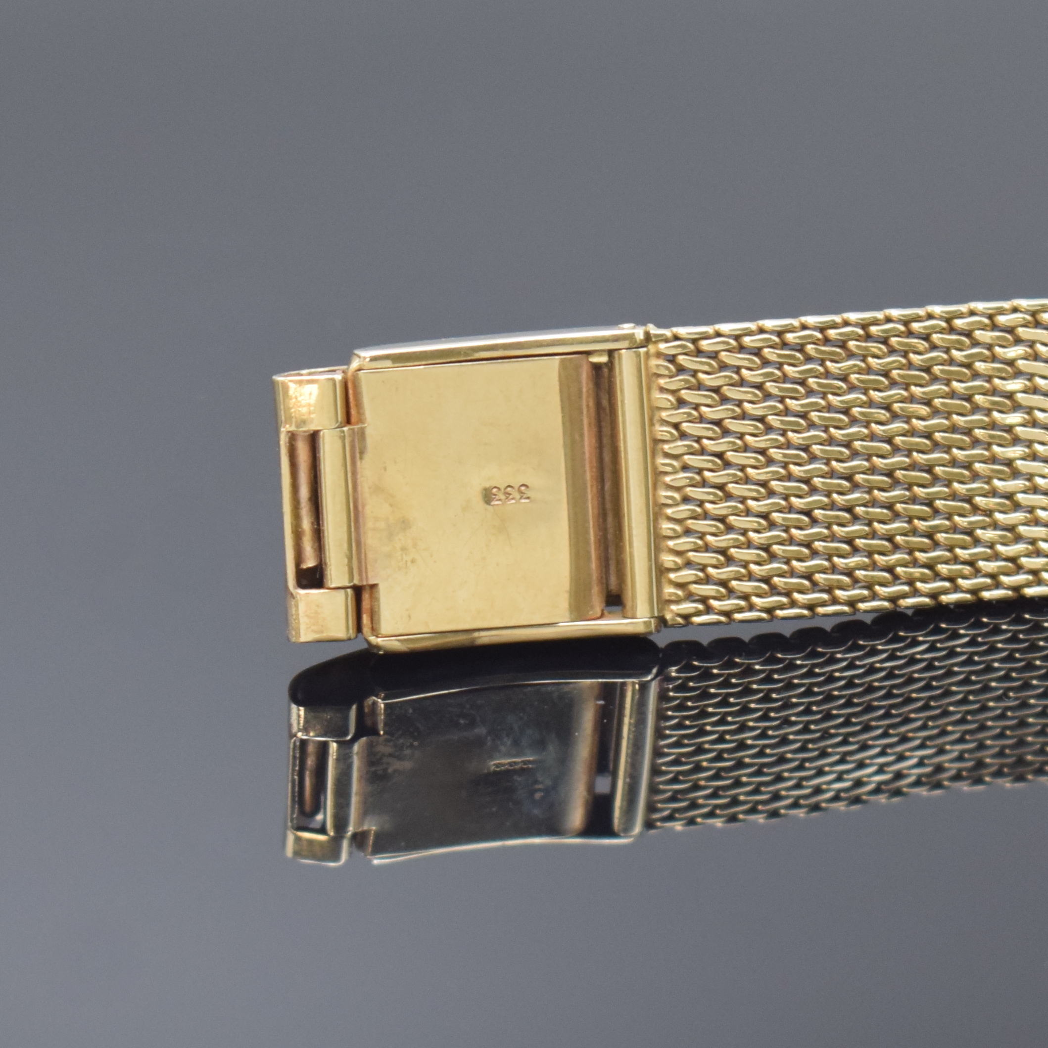 Detail b: ROAMER Herrenarmbanduhr in GG 585/000, Schweiz um 1965, Handaufzug, GG 333/000 Band, Boden aufgedr., silb. Zifferbl. m. gold. Std.-Ind., gold. ...