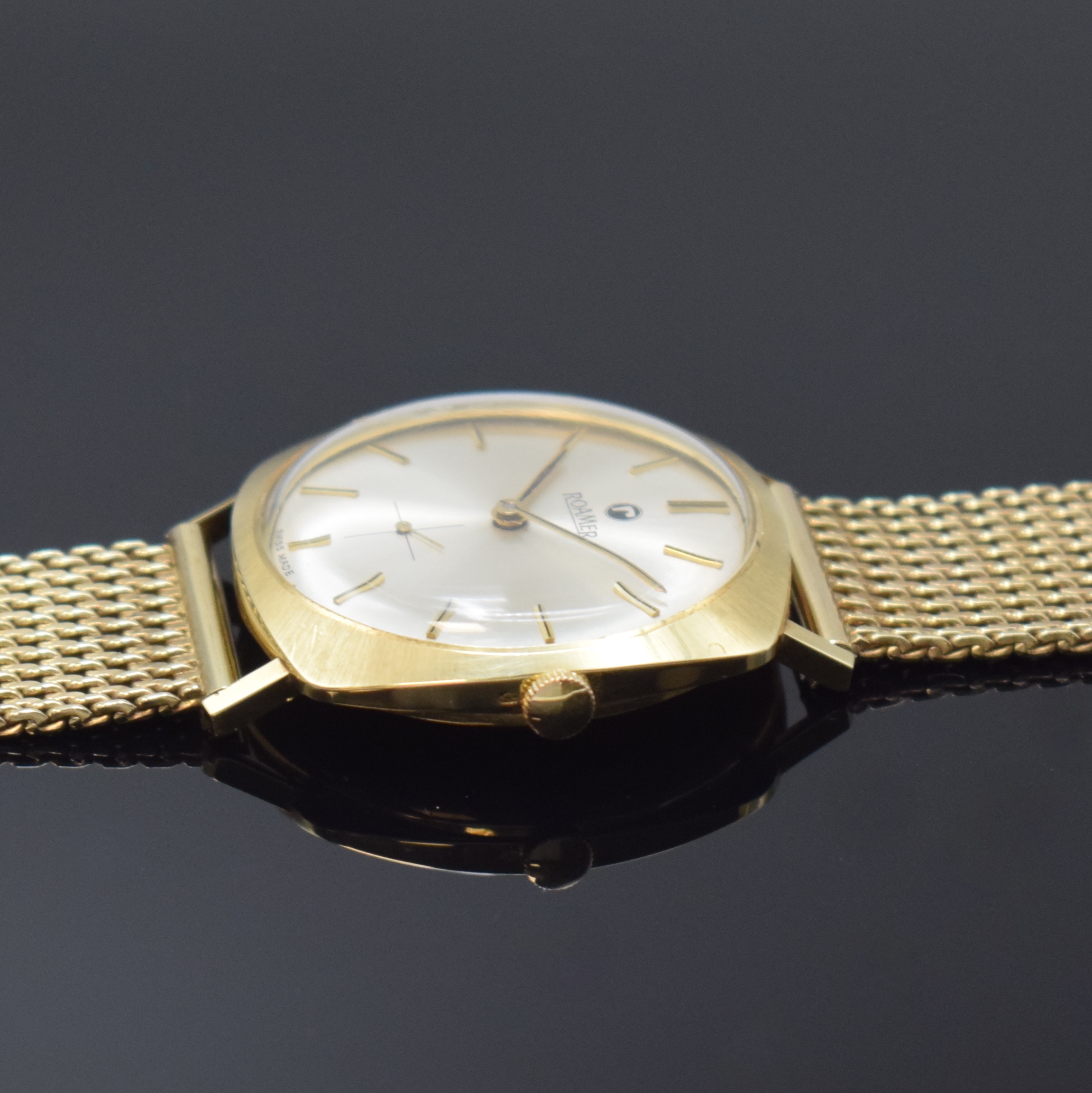 Detail d: ROAMER Herrenarmbanduhr in GG 585/000, Schweiz um 1965, Handaufzug, GG 333/000 Band, Boden aufgedr., silb. Zifferbl. m. gold. Std.-Ind., gold. ...