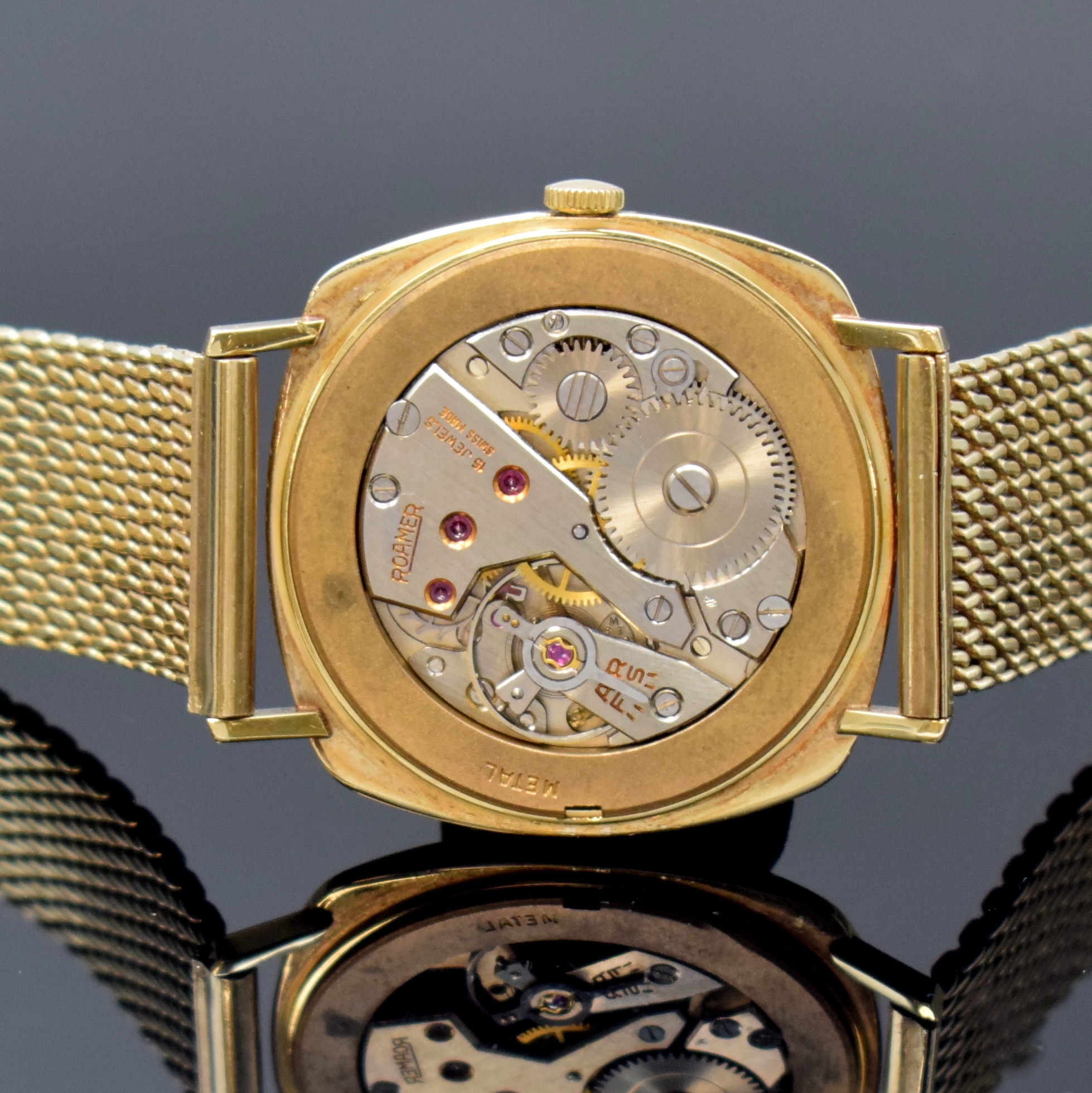 Detail e: ROAMER Herrenarmbanduhr in GG 585/000, Schweiz um 1965, Handaufzug, GG 333/000 Band, Boden aufgedr., silb. Zifferbl. m. gold. Std.-Ind., gold. ...