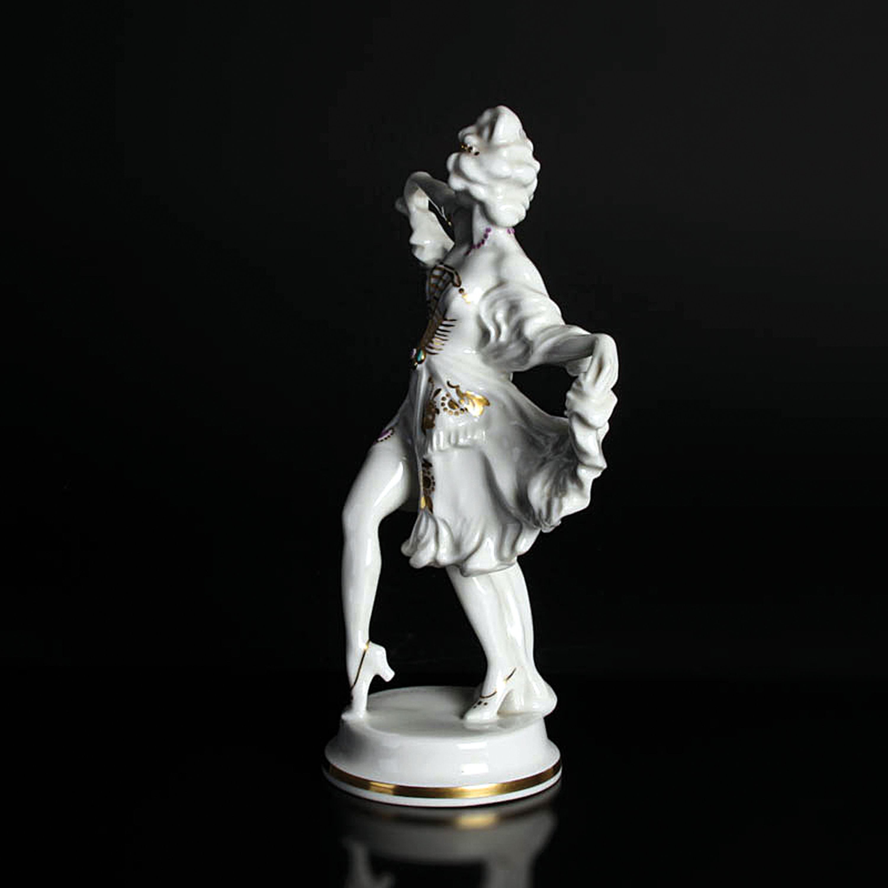 Detail d: Porzellanfigur, Hutschenreuther, Abteilung für Kunst, Tänzerin, sparsam golden und bunt staffiert, H. ca. 28cm